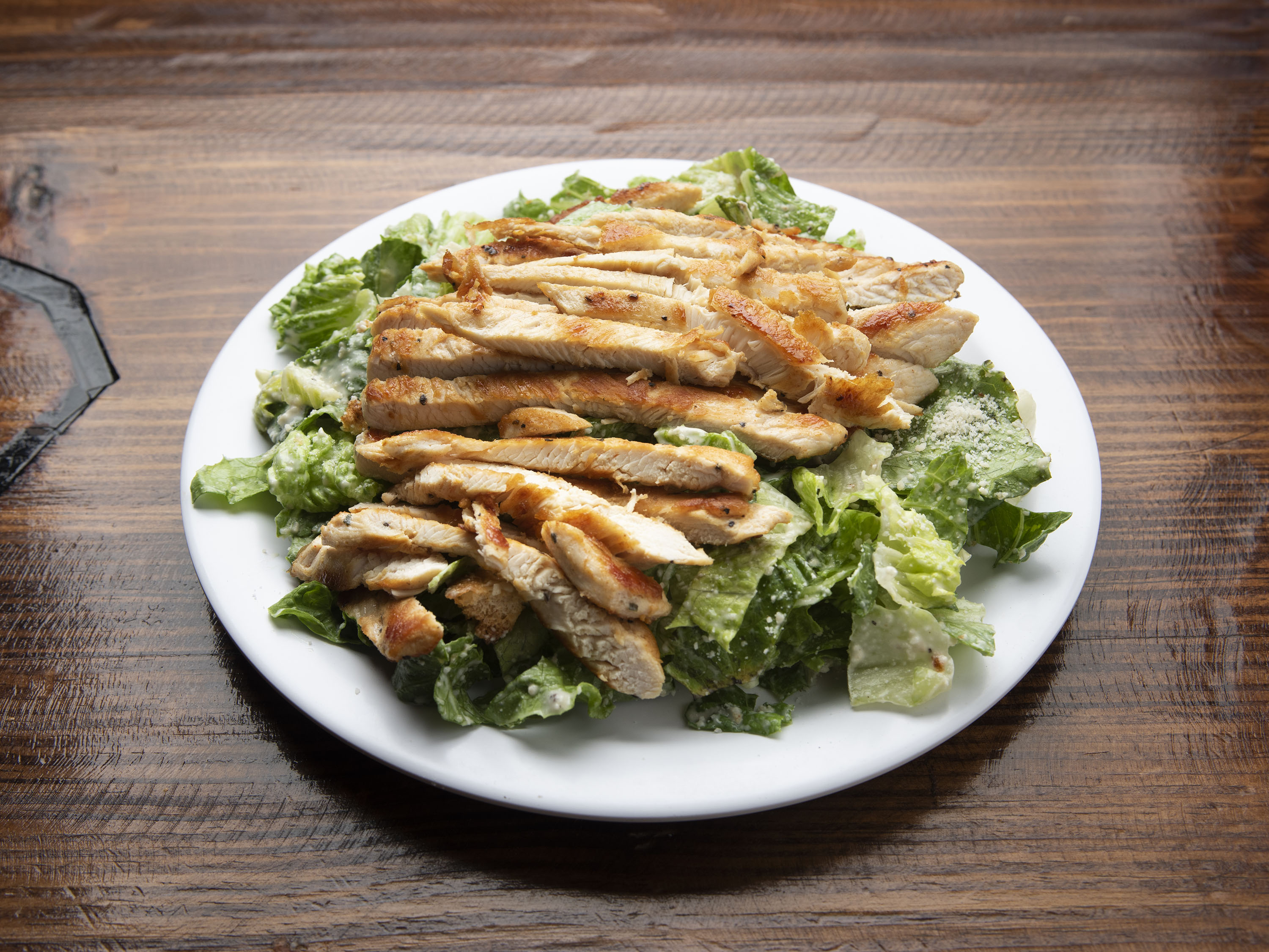 Order Grilled Chicken Caesar Salad food online from The Pizzeria-Mission TX store, Mission on bringmethat.com