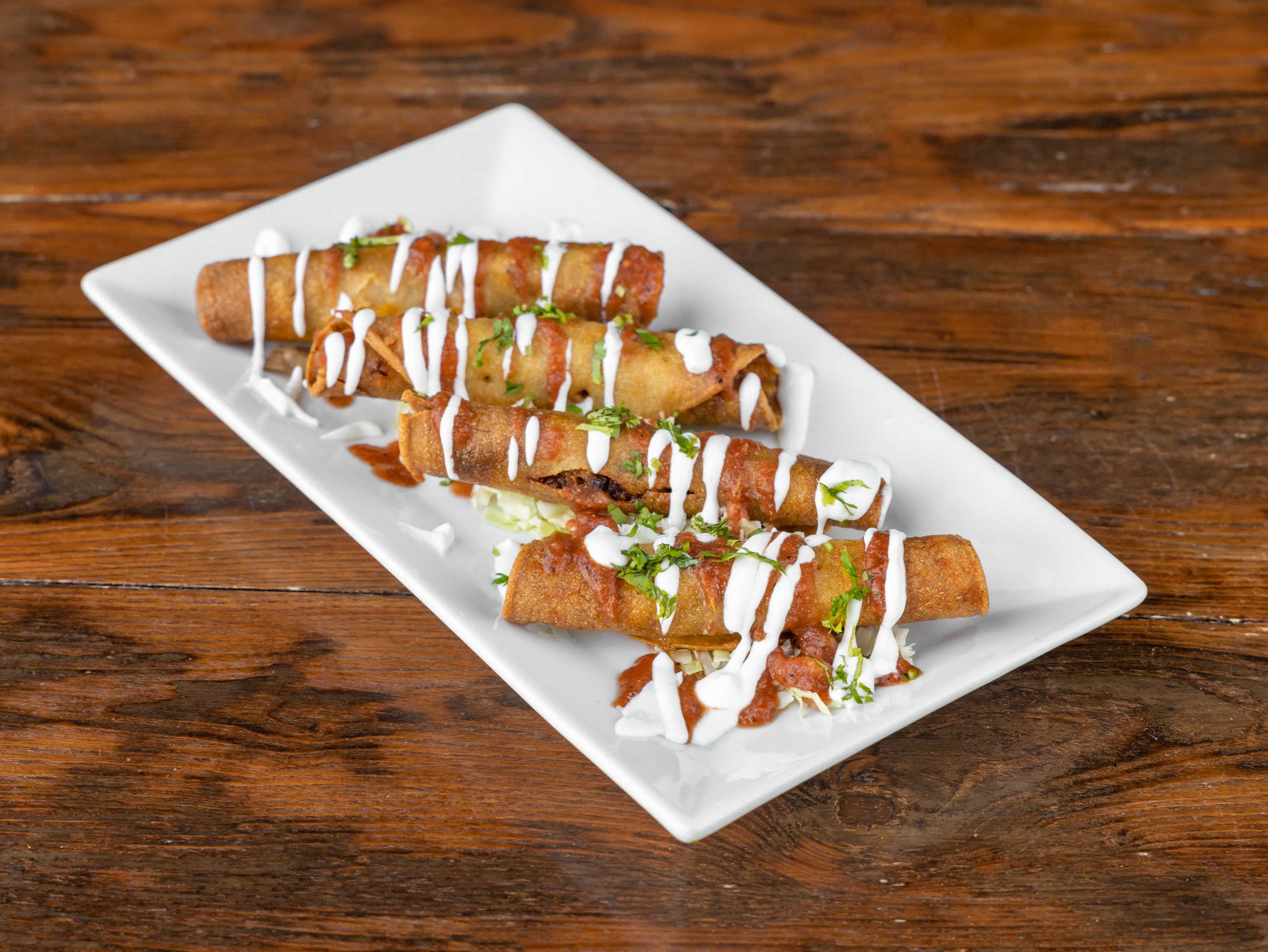 Order Carnitas Taquitos food online from Figueroa Mountain Brewing store, Westlake Village on bringmethat.com
