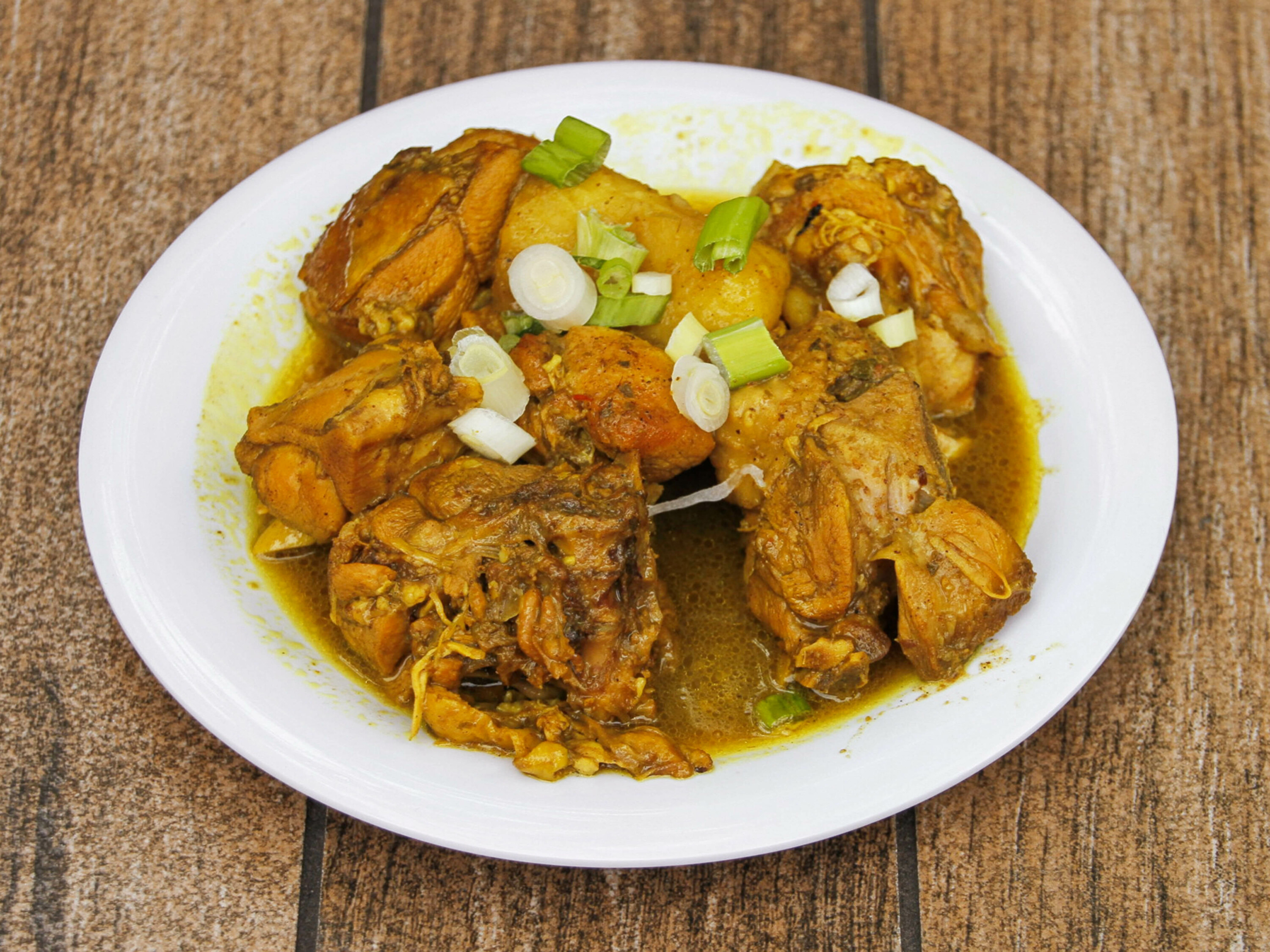 Order Curry Chicken food online from Kaieteur Restaurant & Bakery store, Bronx on bringmethat.com