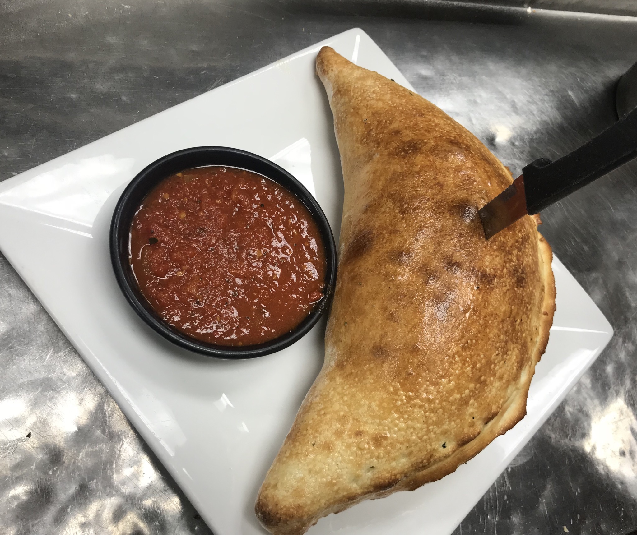 Order Pepperoni Calzone food online from Tuscany Italian Bistro store, Richardson on bringmethat.com