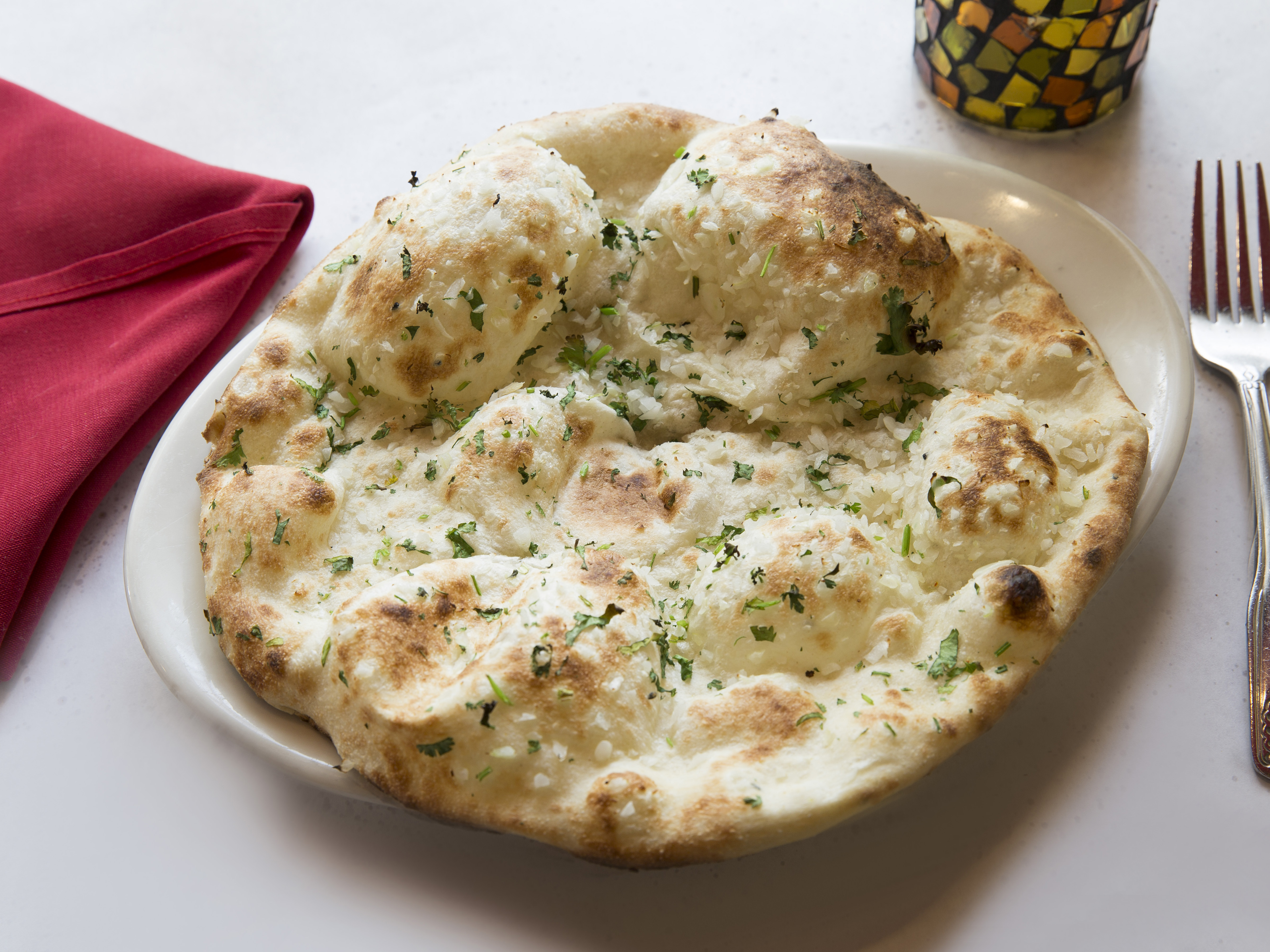 Order Naan food online from Lal Mirch Indian Restaurant store, Agoura Hills on bringmethat.com