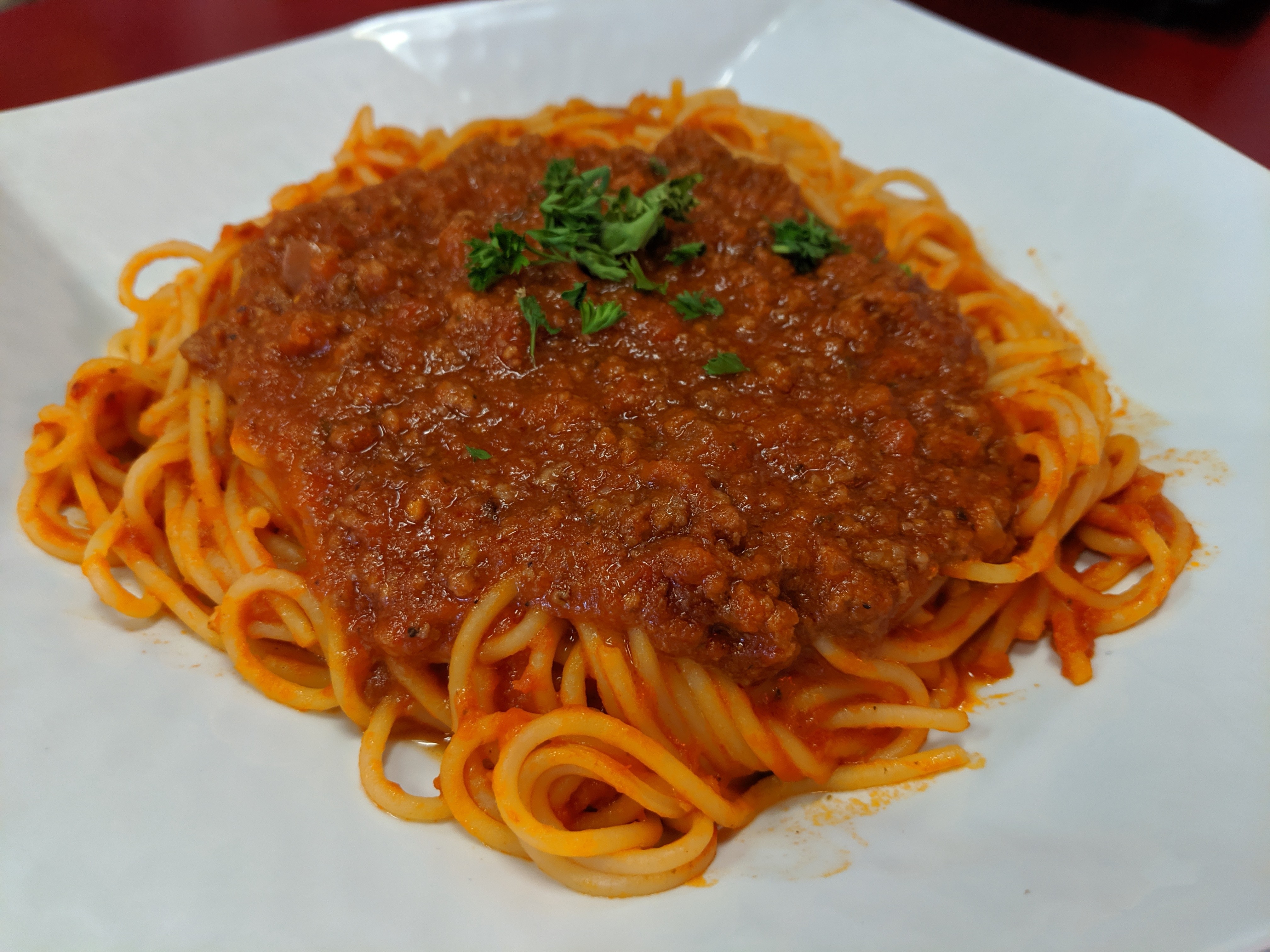 Order Spaghetti with Meat Sauce food online from Deli News Pizza store, Long Beach on bringmethat.com
