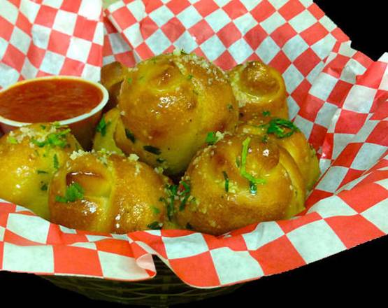 Order 8 Garlic Knots food online from Cuzino's Family Kitchen store, Northeast on bringmethat.com