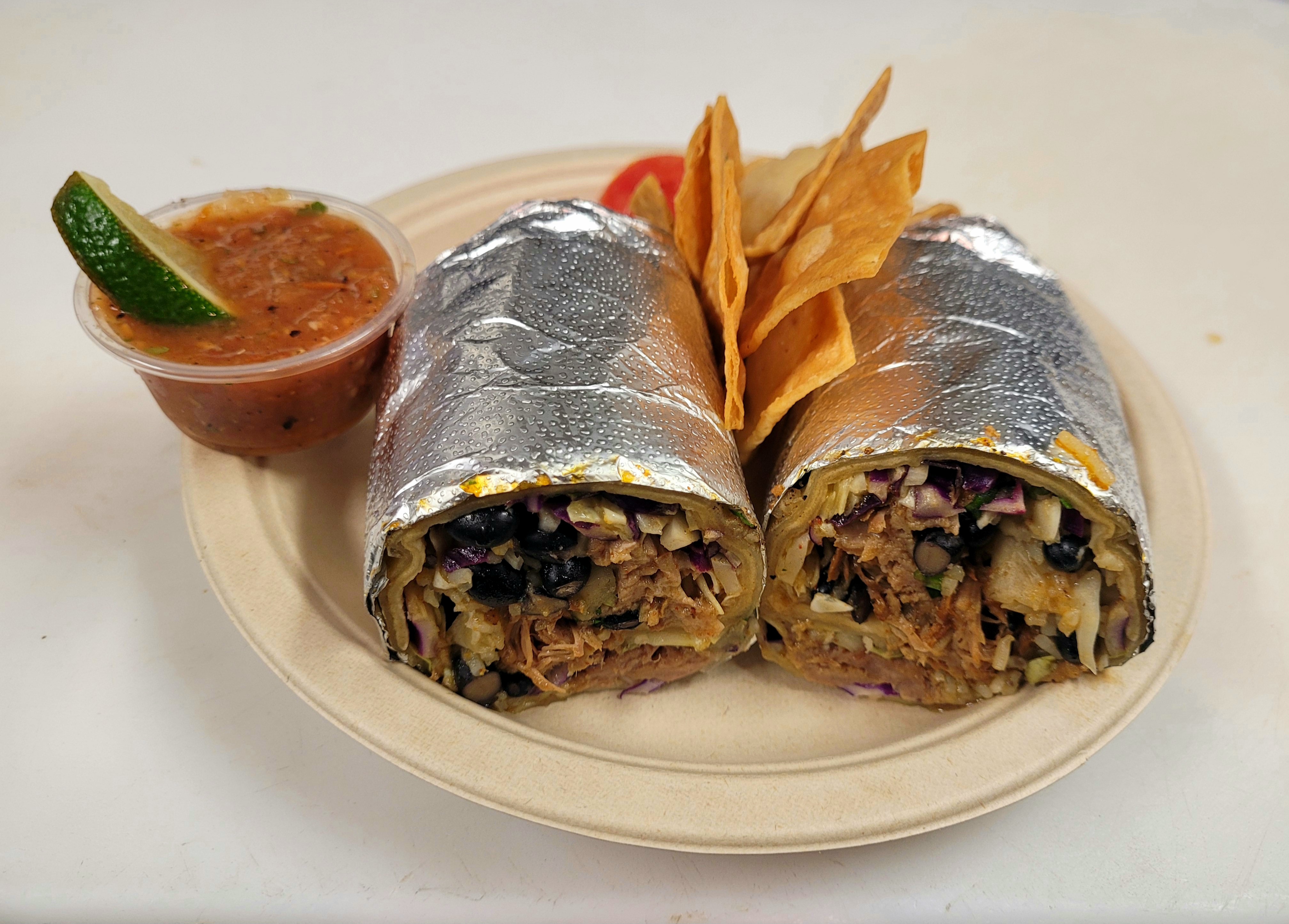 Order Carnitas Rasta Burrito food online from Rasta Taco store, Laguna Beach on bringmethat.com