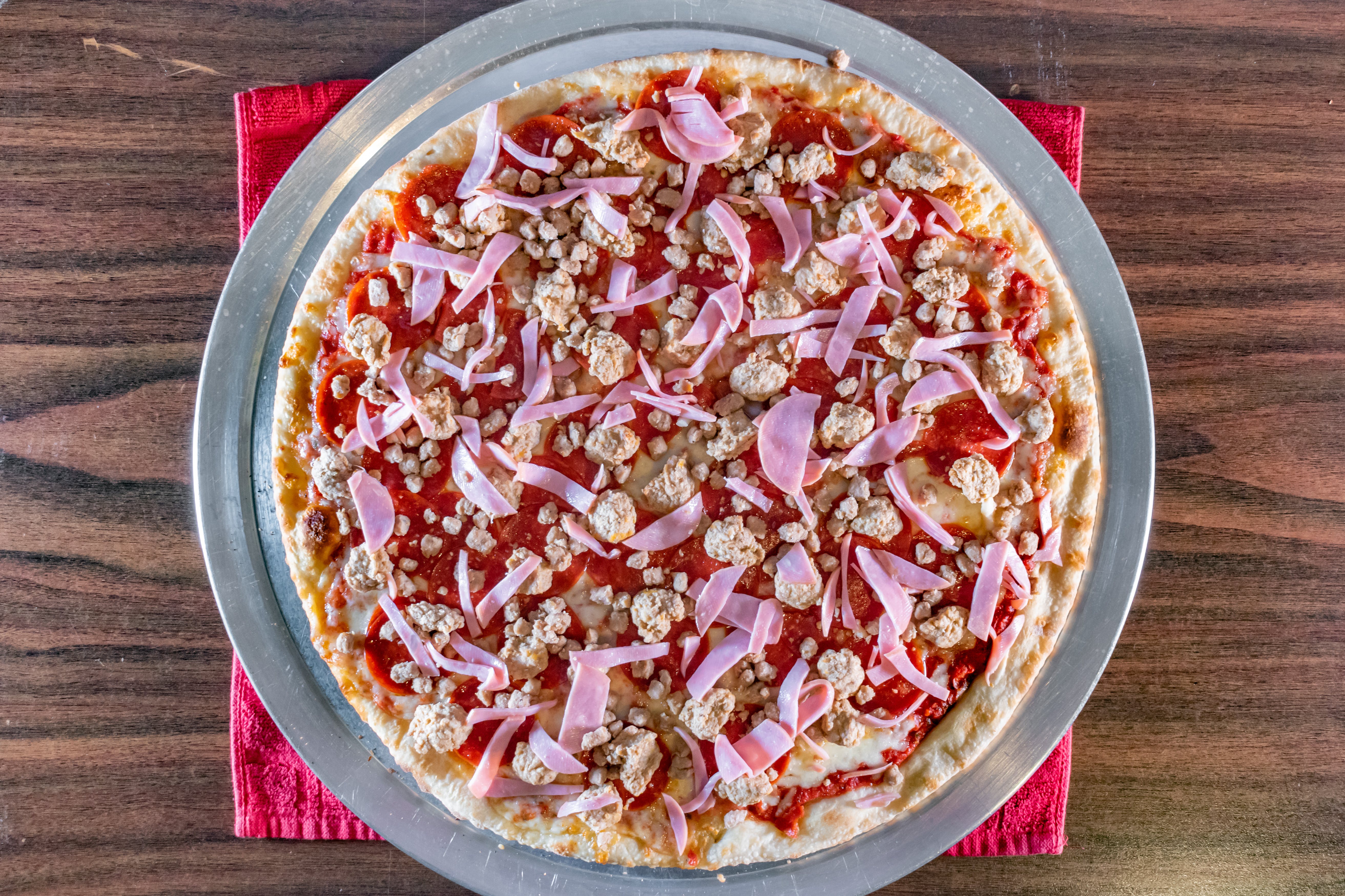Order Meat Town Pizza - 12'' food online from Gotham Pizza store, Houston on bringmethat.com