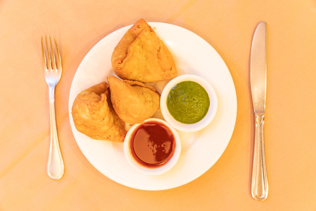 Order Samosas food online from Spice symphony store, New York on bringmethat.com