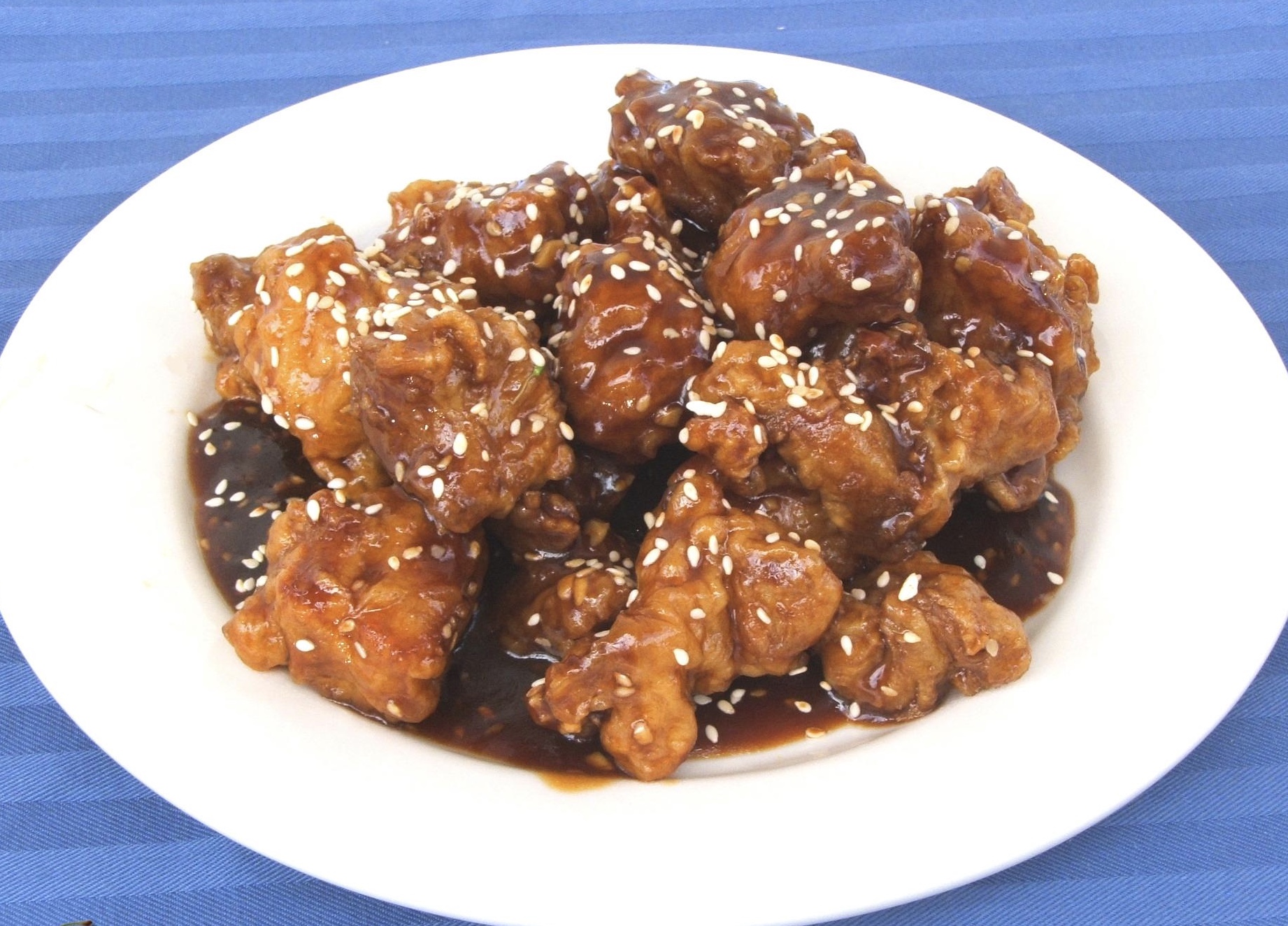 Order 36. Sesame Chicken food online from First Chinese Express store, Lemon Grove on bringmethat.com