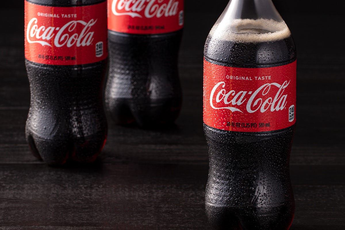 Order Coke 20oz Bottle food online from P.F. Chang store, Dallas on bringmethat.com
