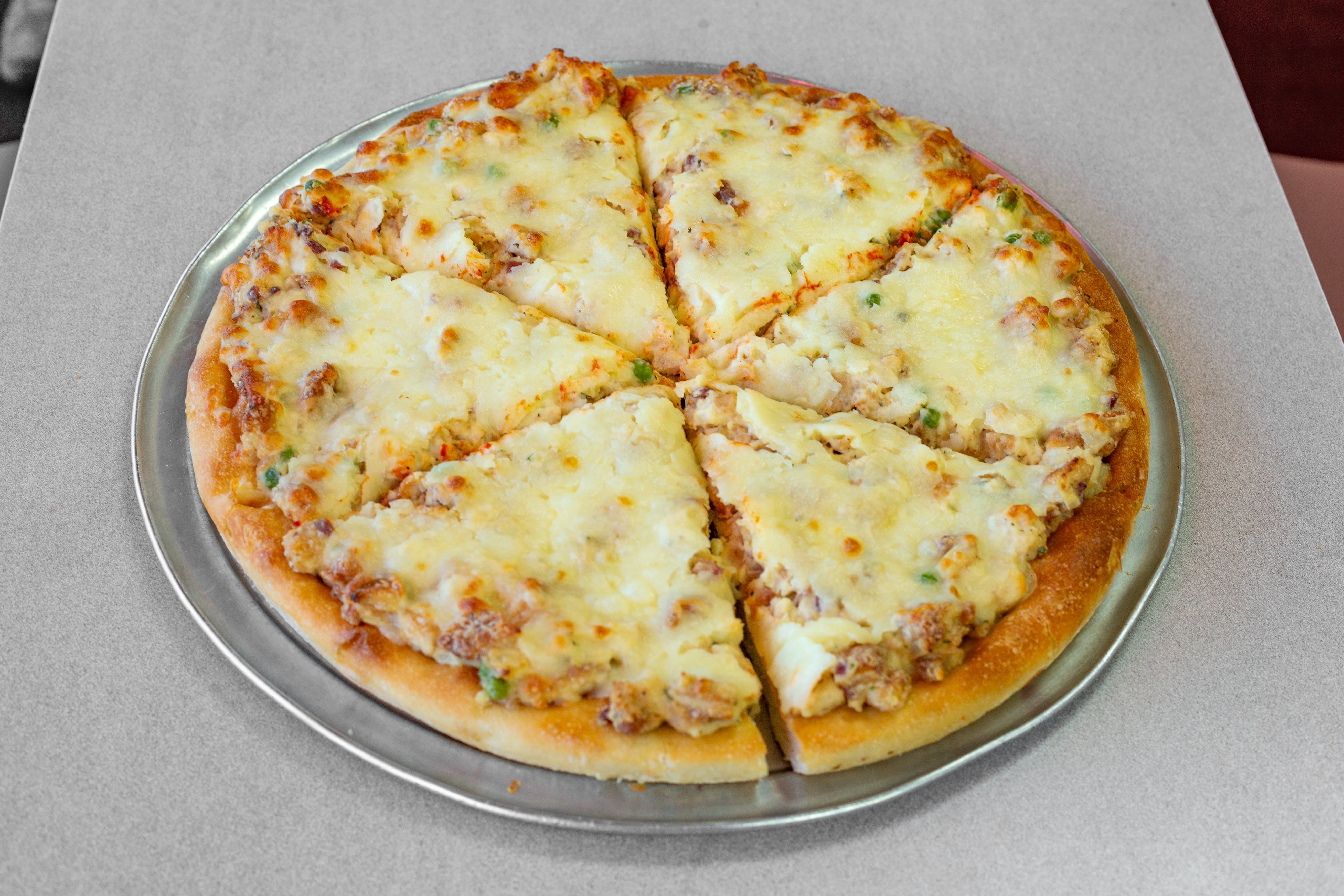Order Chicken Carbonara Pie - Pizza food online from La Famosa Pizza store, Holtsville on bringmethat.com