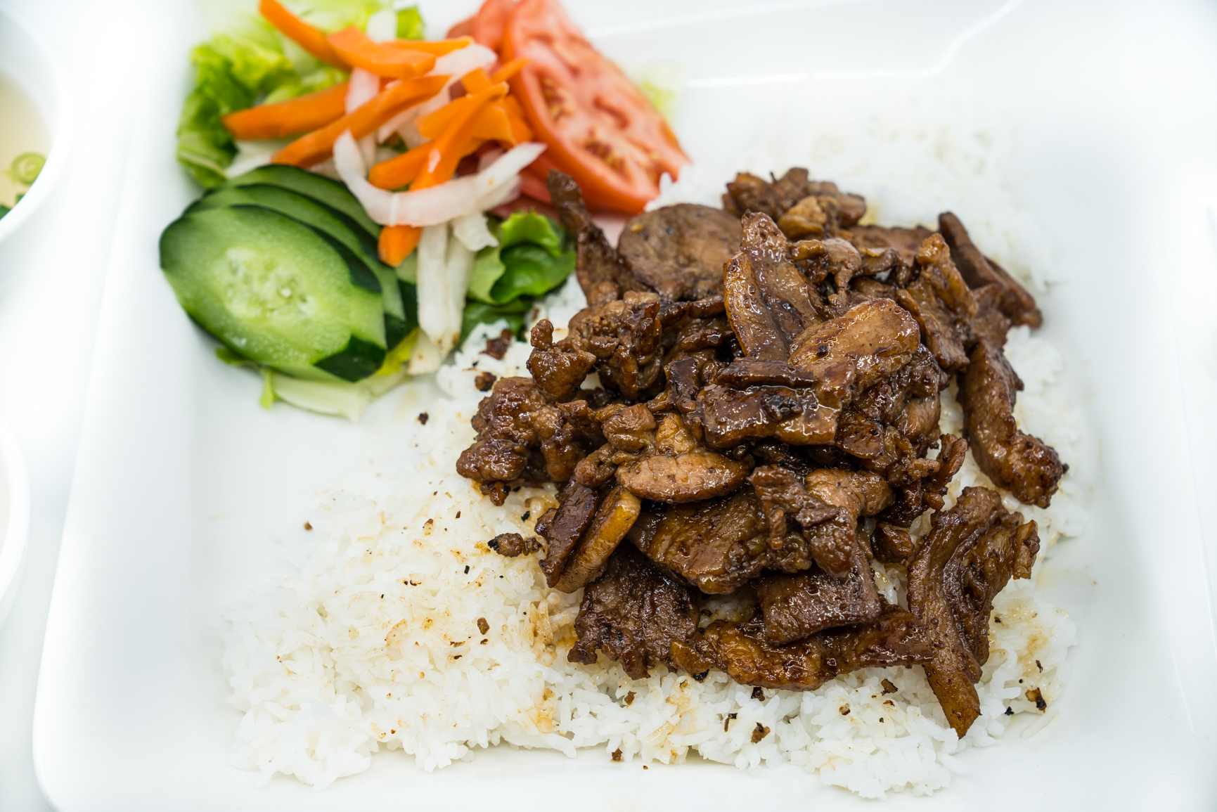 Order BBQ Sirloin Pork Slices Rice Plate food online from Ha Long Pho Noodle House store, Honolulu on bringmethat.com