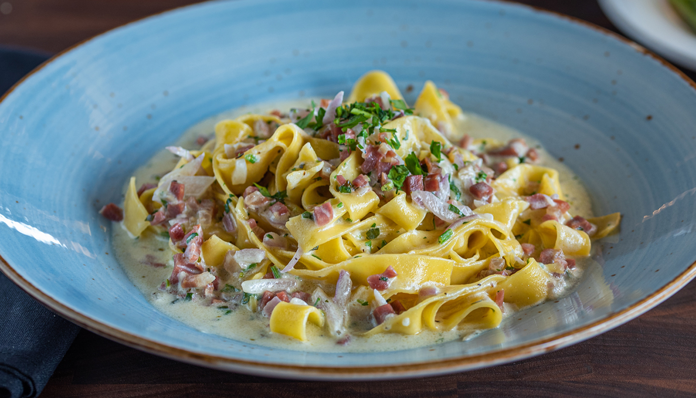 Order Pappardelle Carbonara food online from Russo's Pizza store, Austin on bringmethat.com