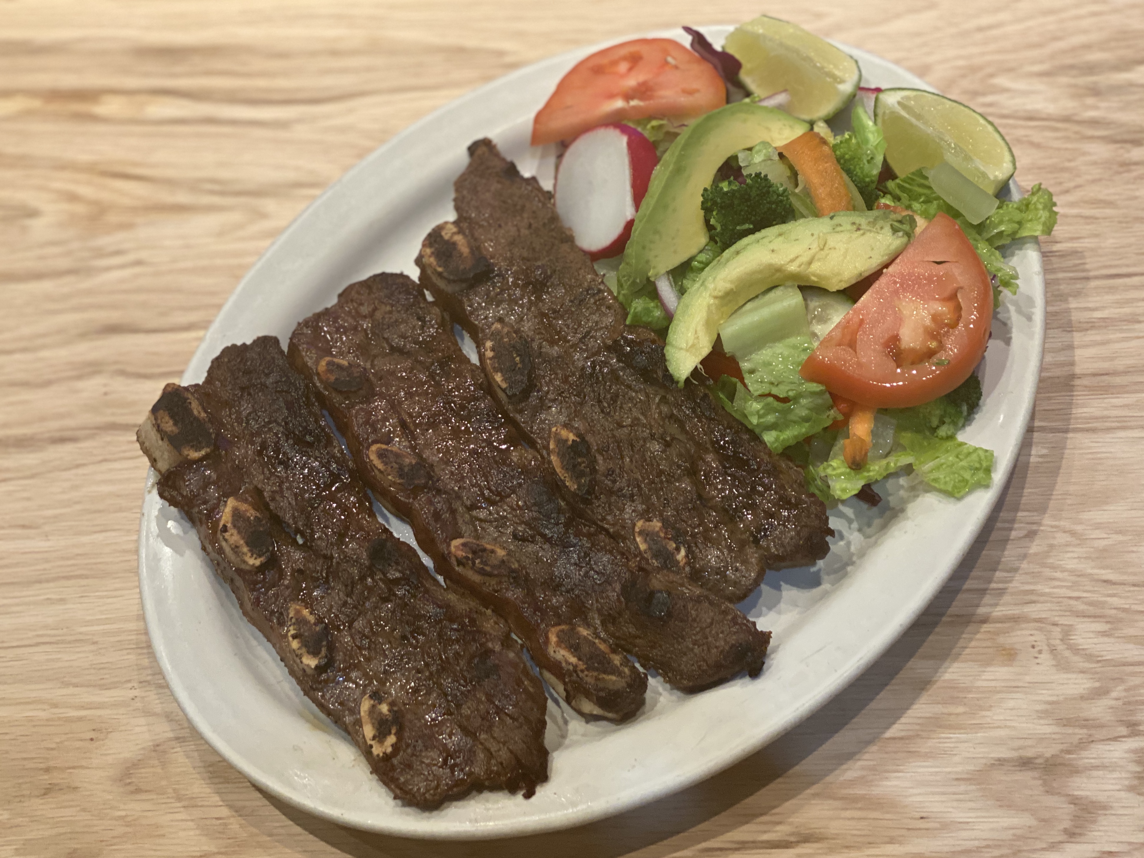Order Charred Beef short ribs  food online from Puebla Seafood store, Jackson Heights on bringmethat.com