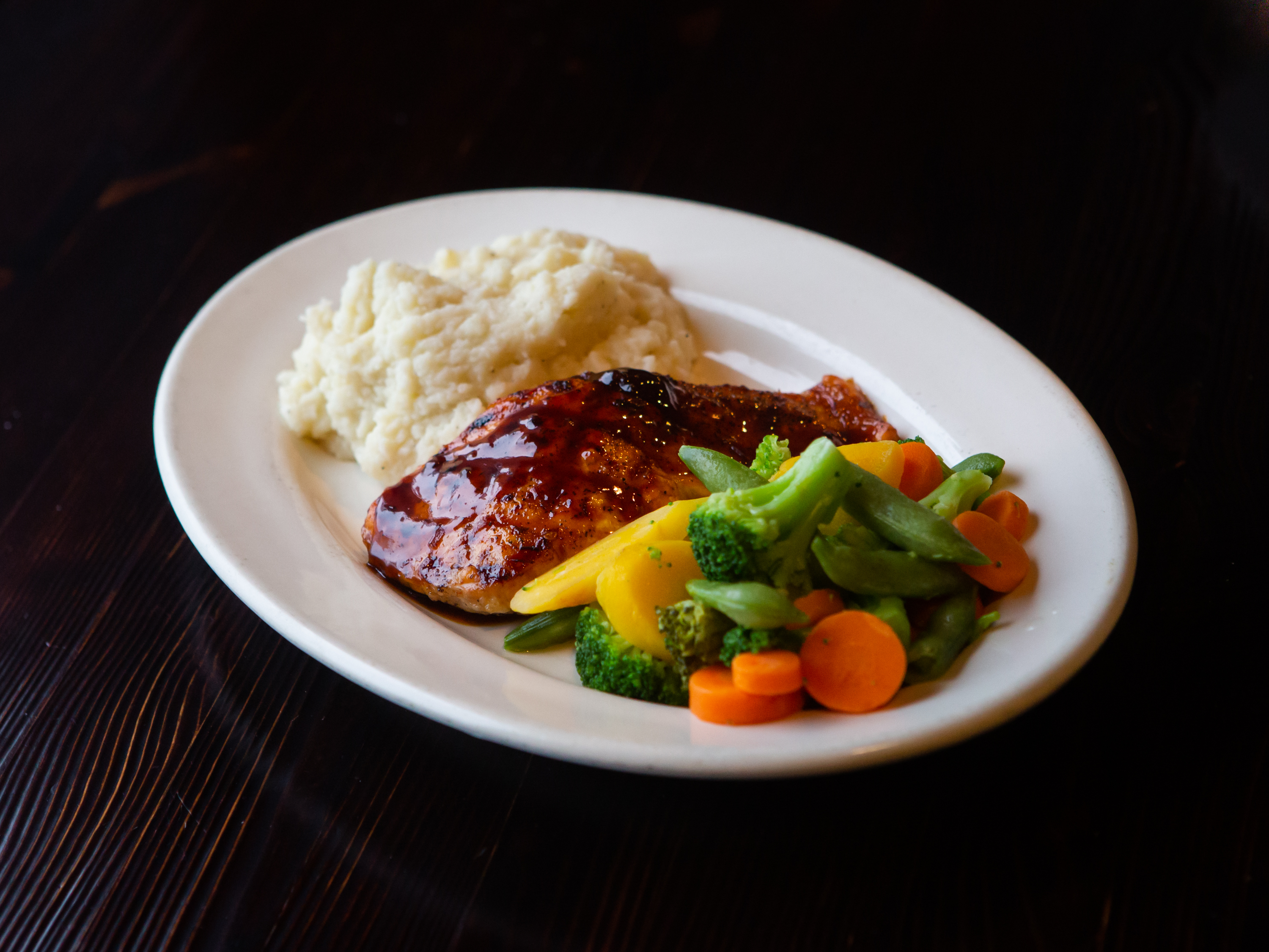 Order Grilled Salmon with Jameson Glaze food online from Level 20 Sports Restaurant store, Bethel Park on bringmethat.com