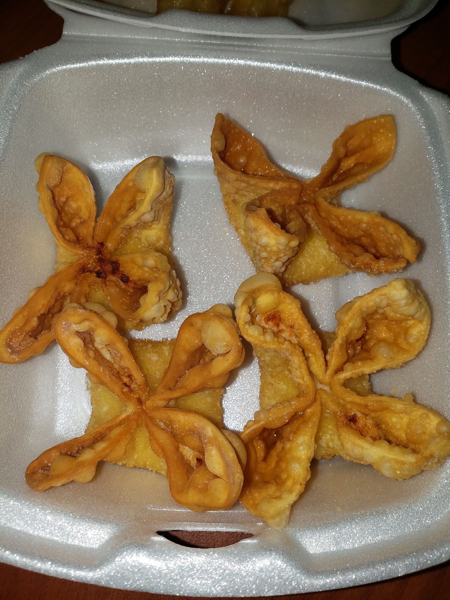 Order 4 Piece Crab Rangoons  food online from Fuji To Go store, Bedford on bringmethat.com