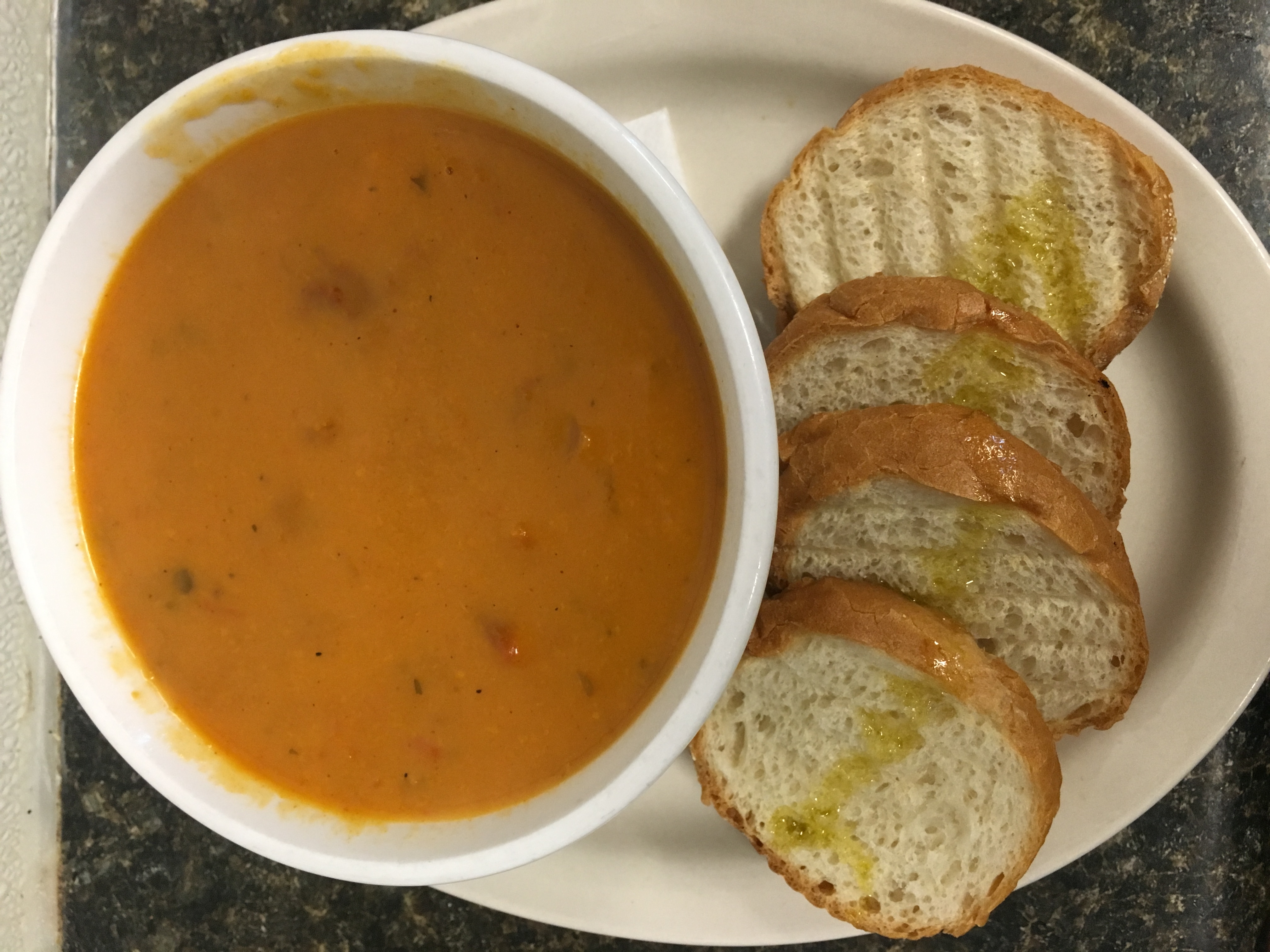 Order Creamy Tomato Basil Soup food online from Iguana Cafe store, Chicago on bringmethat.com