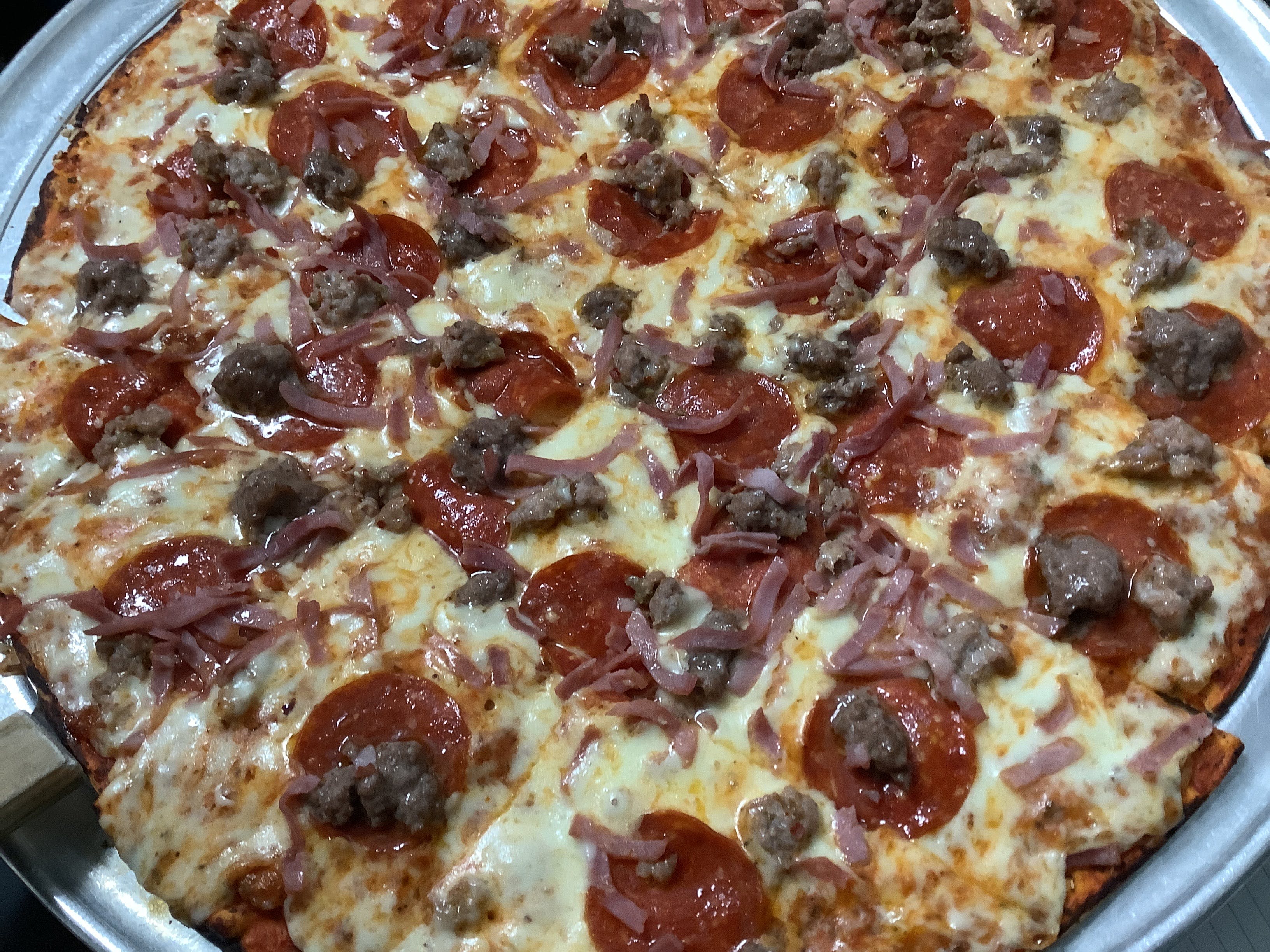 Order The Butcher Shop Pizza - X-Small 10'' food online from Pizza Garden store, Manitowoc on bringmethat.com