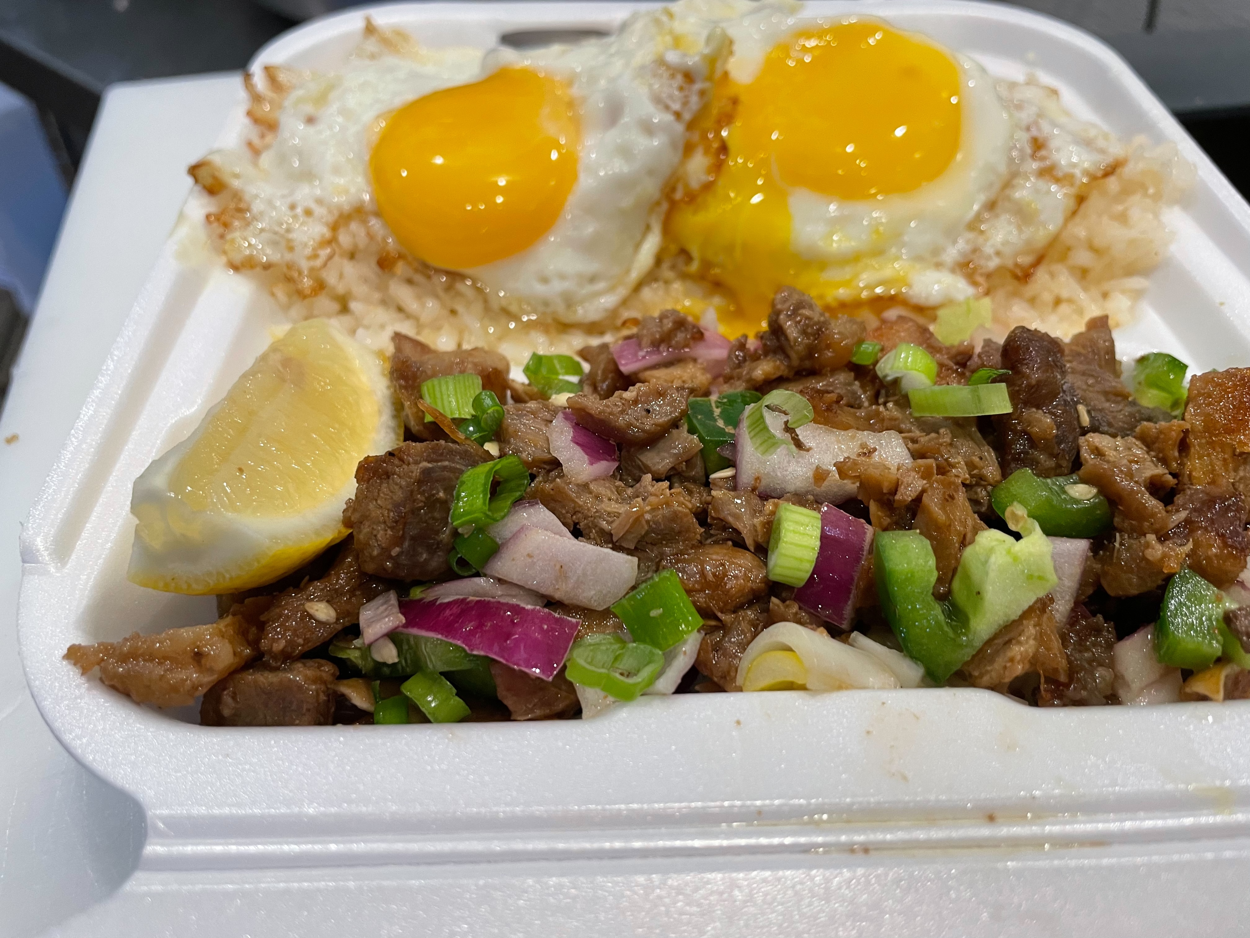 Order Sisig silog food online from Apong's Philly Steak store, Rancho Mirage on bringmethat.com