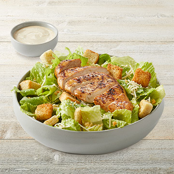 Order Caesar Salad With Grilled Chicken food online from TGI Fridays store, Massapequa Park on bringmethat.com