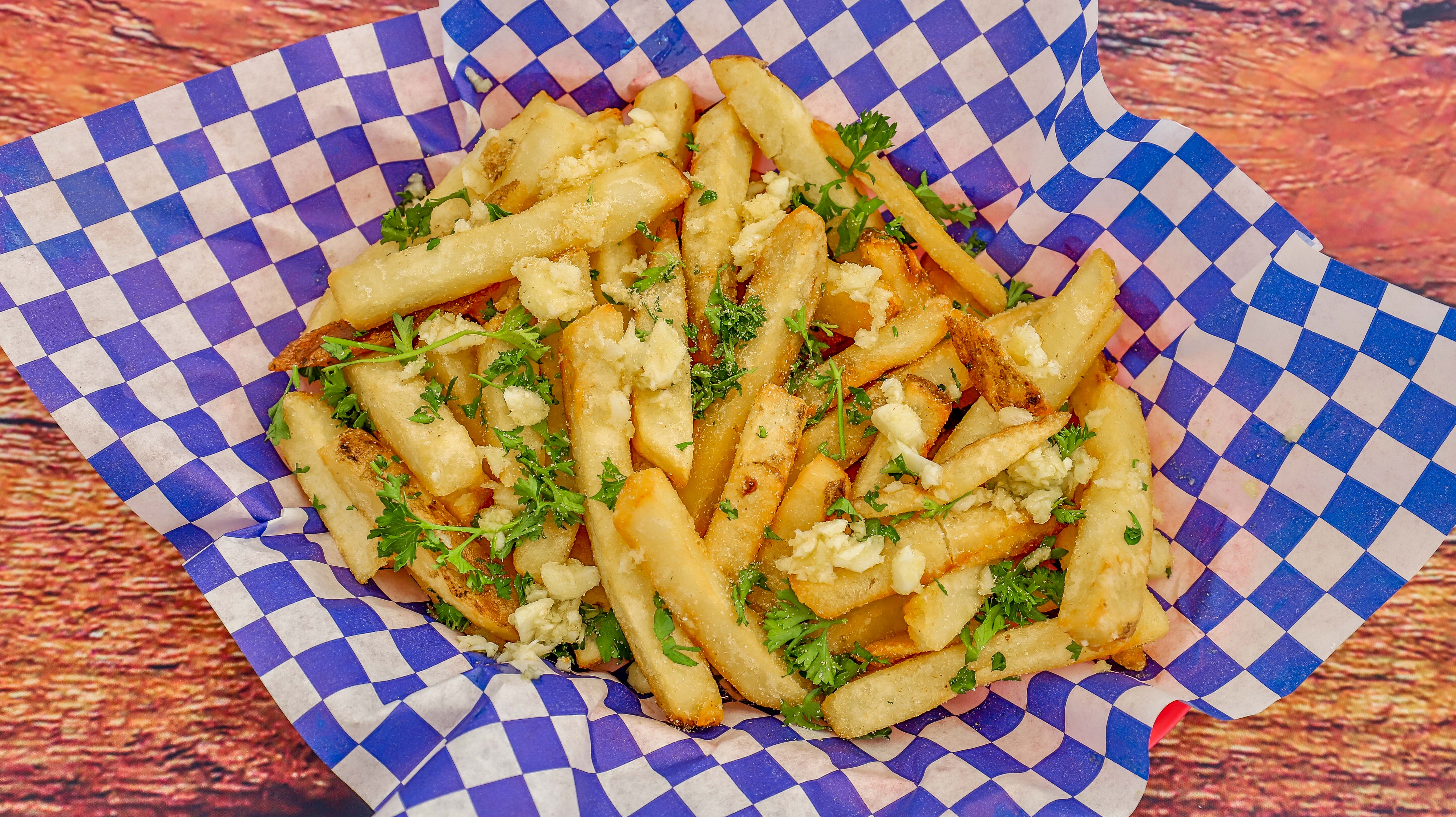 Order Garlic Fries food online from The Codmother Fish & Chips store, San Francisco on bringmethat.com