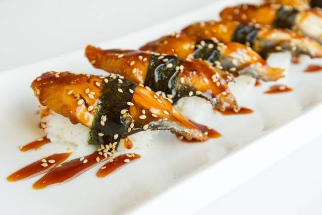 Order Unagi (eel) Nigiri (2pc) food online from B Cafe store, Quincy on bringmethat.com