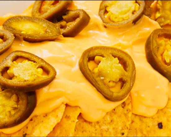 Order Nachos with Jalapenos food online from M & M's Carnival Foods store, Midland on bringmethat.com