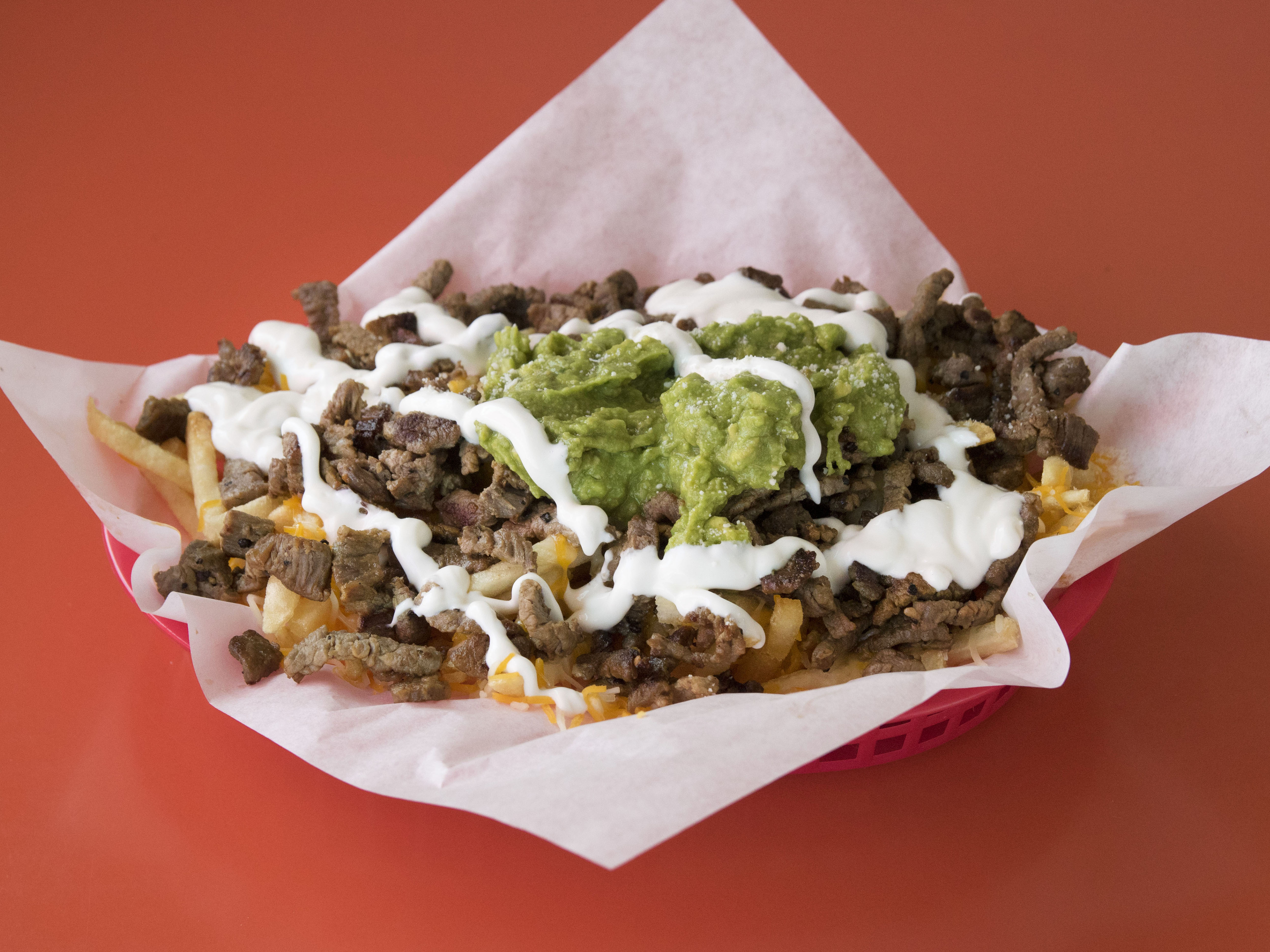 Order Large California Fries food online from Tacoman store, National City on bringmethat.com
