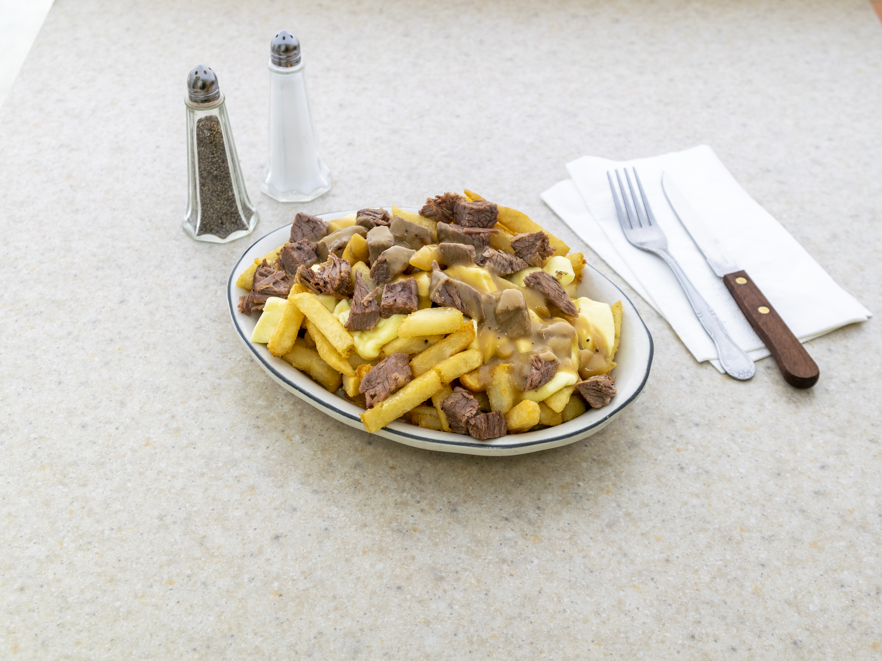 Order Poutine food online from Goodman's Deli and Restaurant store, Berkeley Heights on bringmethat.com