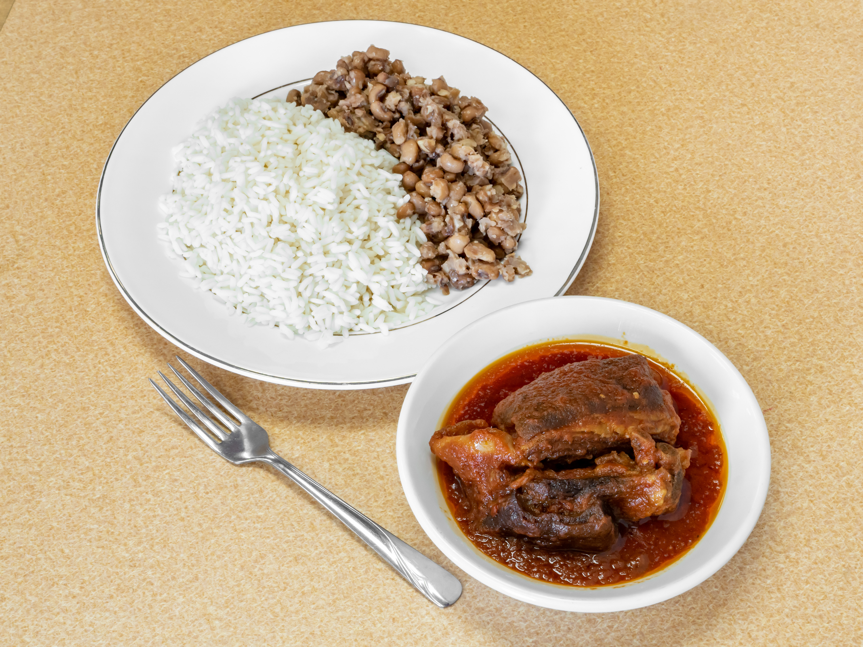 Order Rice and Beans food online from Toni's African Deli store, Crystal on bringmethat.com