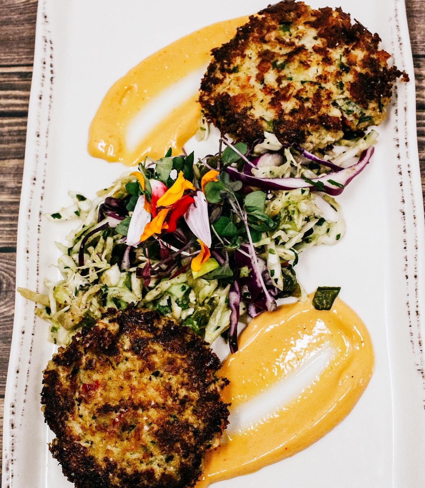 Order Tortilla-Crusted Crab Cakes food online from Tonto Bar & Grill store, Cave Creek on bringmethat.com