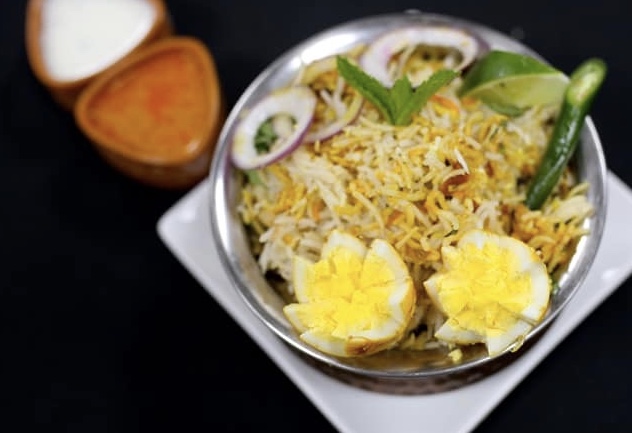 Order Kodi Guddu Special Biryani food online from Godavari Restaurant store, East Hartford on bringmethat.com