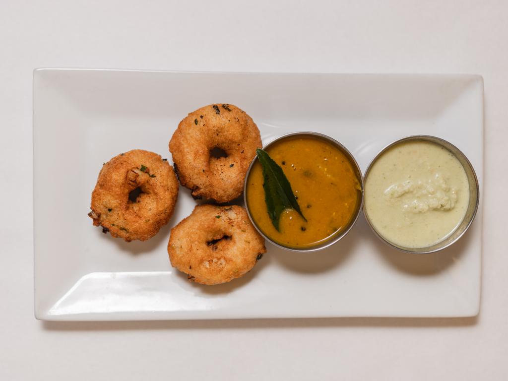 Order Medu Vadai with sambar and coconut chutney (vegan) food online from Southern Spice store, New Hyde Park on bringmethat.com