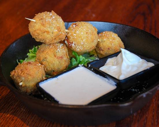 Order CRISPY LOADED POTATO BITES food online from Tap House Grill store, Palatine on bringmethat.com