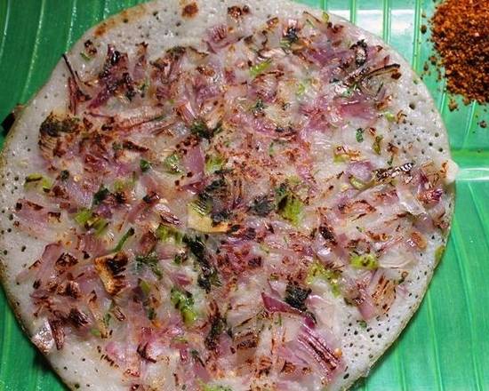 Order Onion Uthappam food online from Baisakhi Dhaba store, Topeka on bringmethat.com