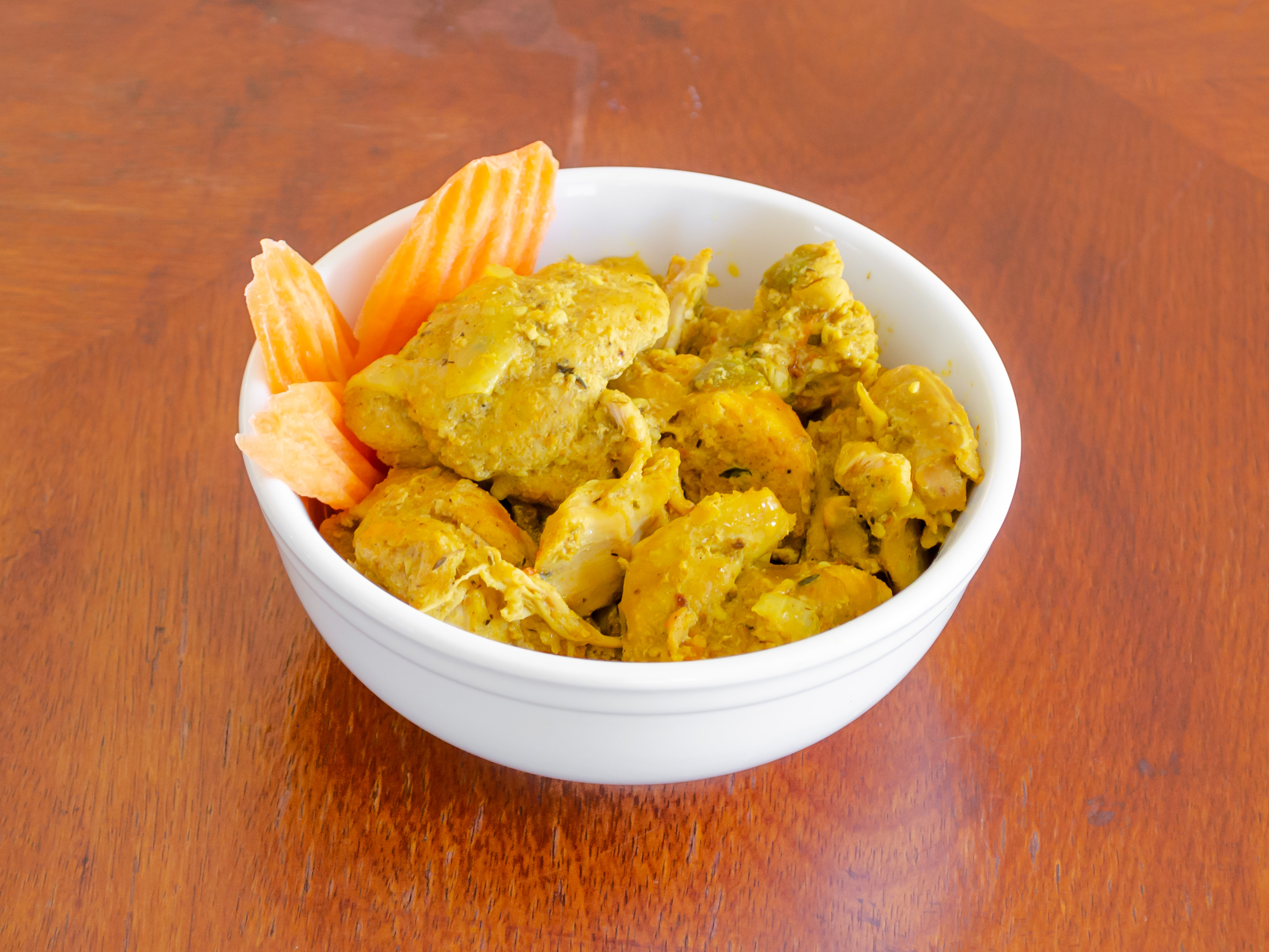 Order Curried Chicken food online from Dainty Kitchen store, Colorado Springs on bringmethat.com