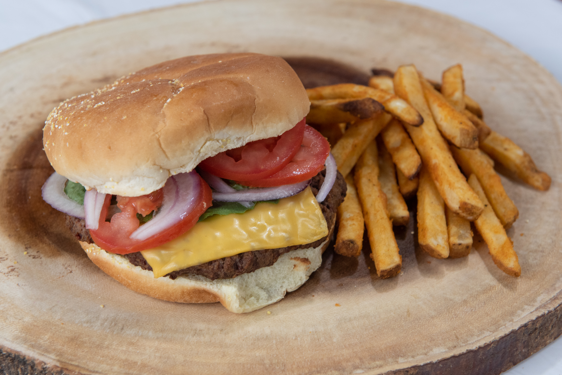 Order cheese burger & fries food online from Milanos Pizzeria store, Nashville on bringmethat.com