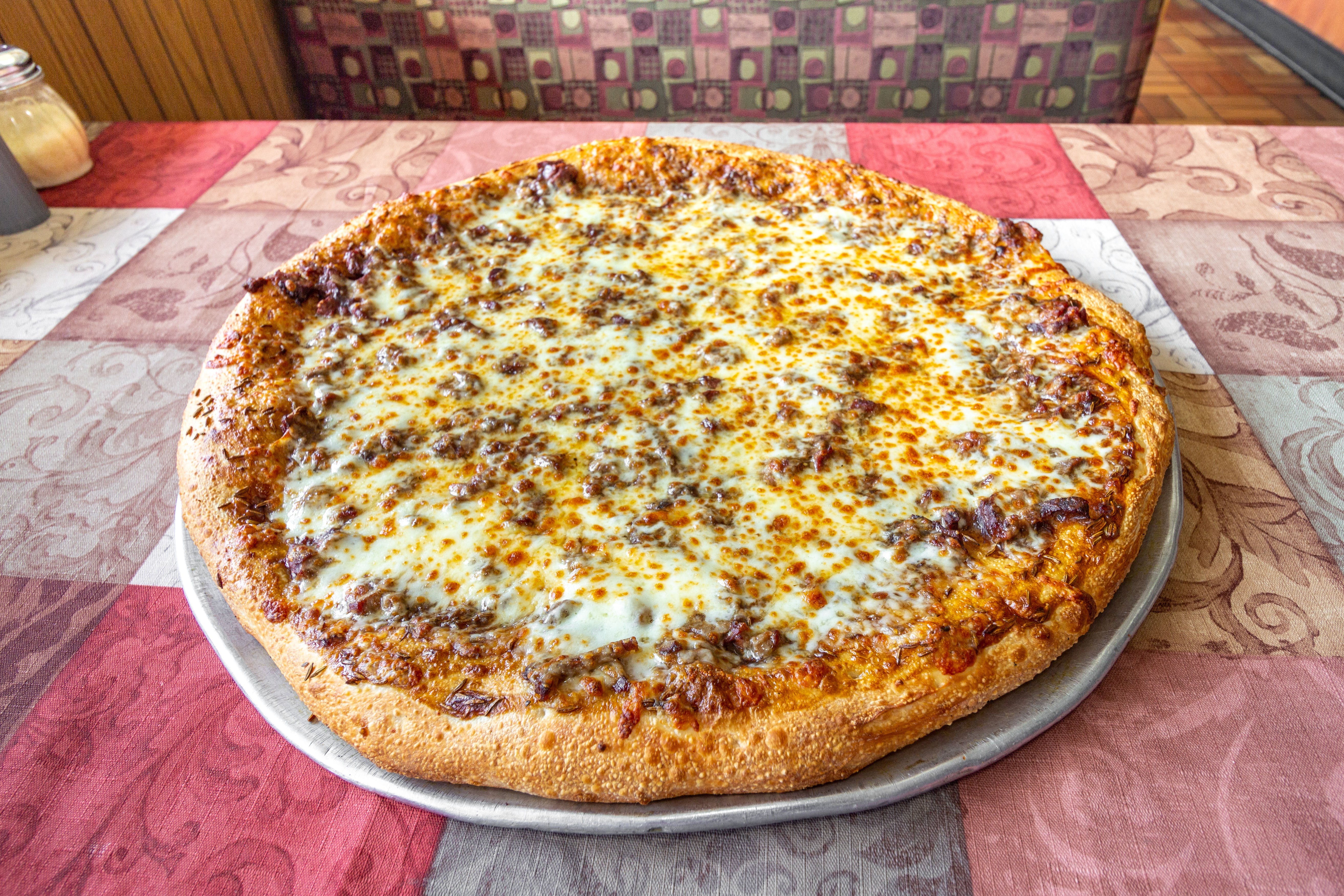 Order Beef on Weck Pizza - Solo 10'' food online from Chick-N-Pizza Works store, Buffalo on bringmethat.com