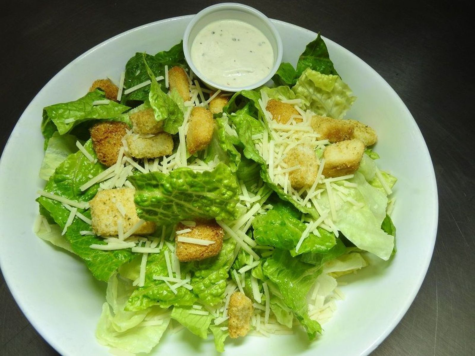 Order Caesar Salad food online from Clockwork Pizza store, Tempe on bringmethat.com