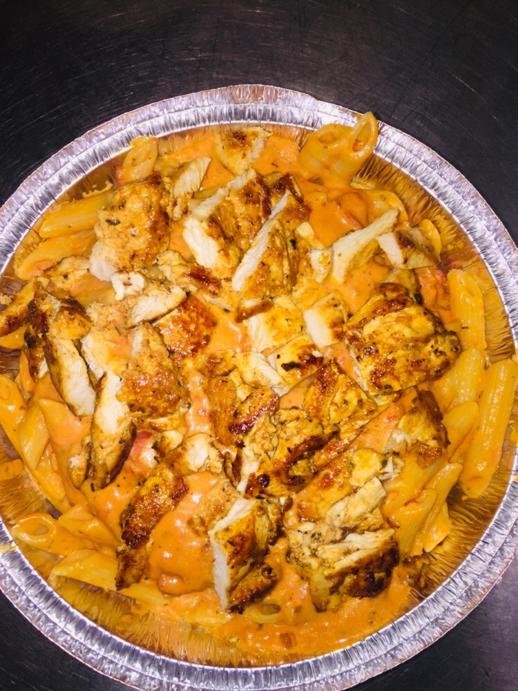 Order Penne ala Vodka with Grilled Chicken food online from Pizza Bella  store, Yonkers on bringmethat.com