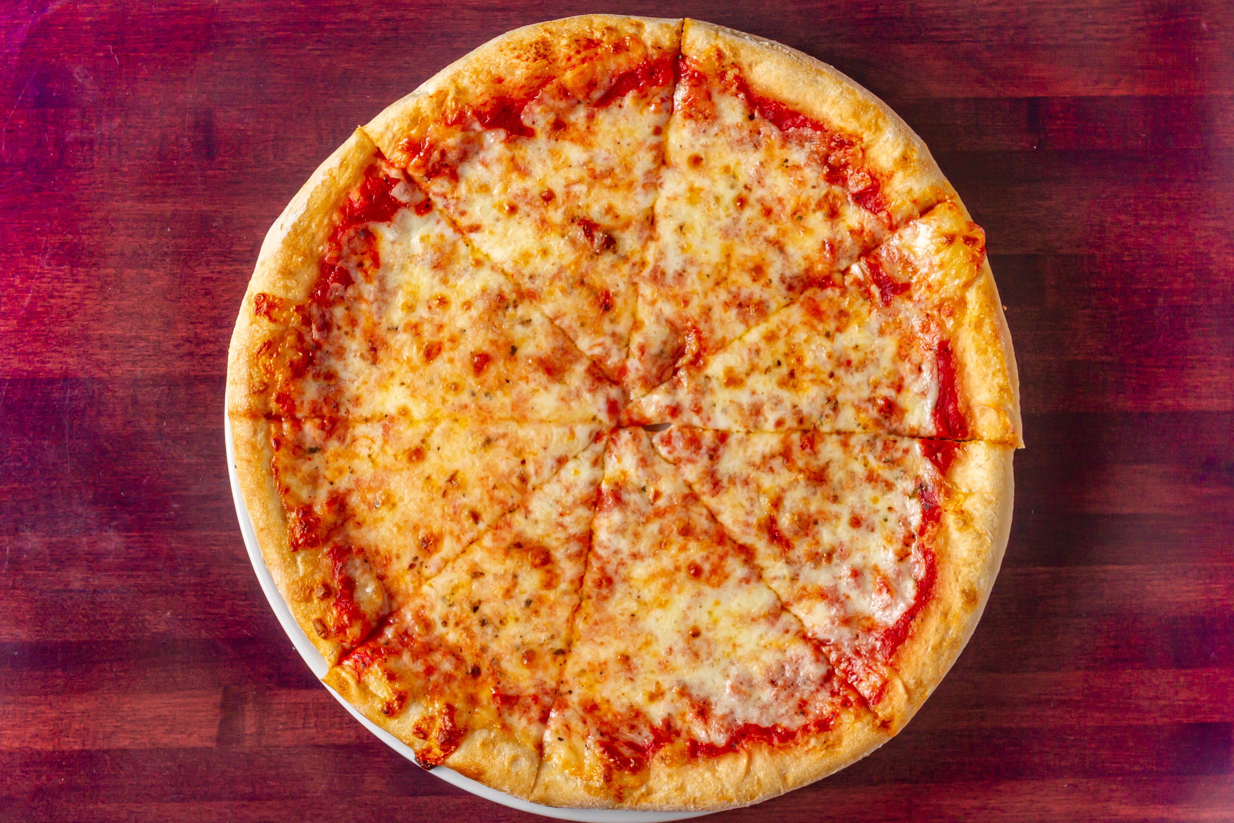 Order Whole Cheese Pizza - 12" food online from Bella Napoli store, Pasadena on bringmethat.com
