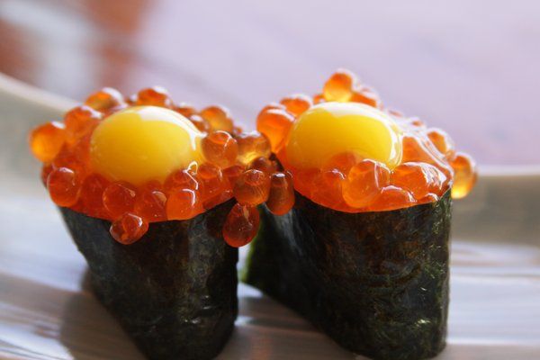 Order Ikura with Quail Egg Sushi food online from Naked Fish Japanese Restaurant store, Chino Hills on bringmethat.com