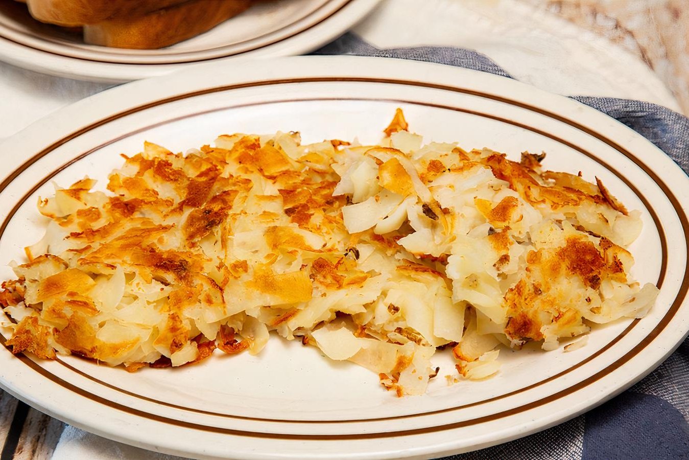 Order Side Hashbrowns food online from Apola Greek Grill store, Irvine on bringmethat.com