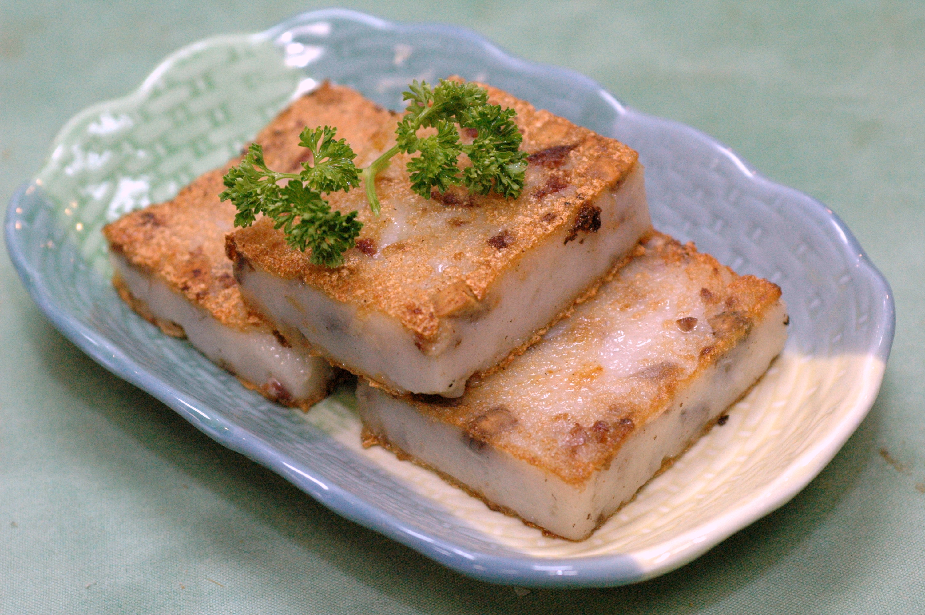 Order Pan Fried Taro Cake food online from Asian Pearl store, Richmond on bringmethat.com