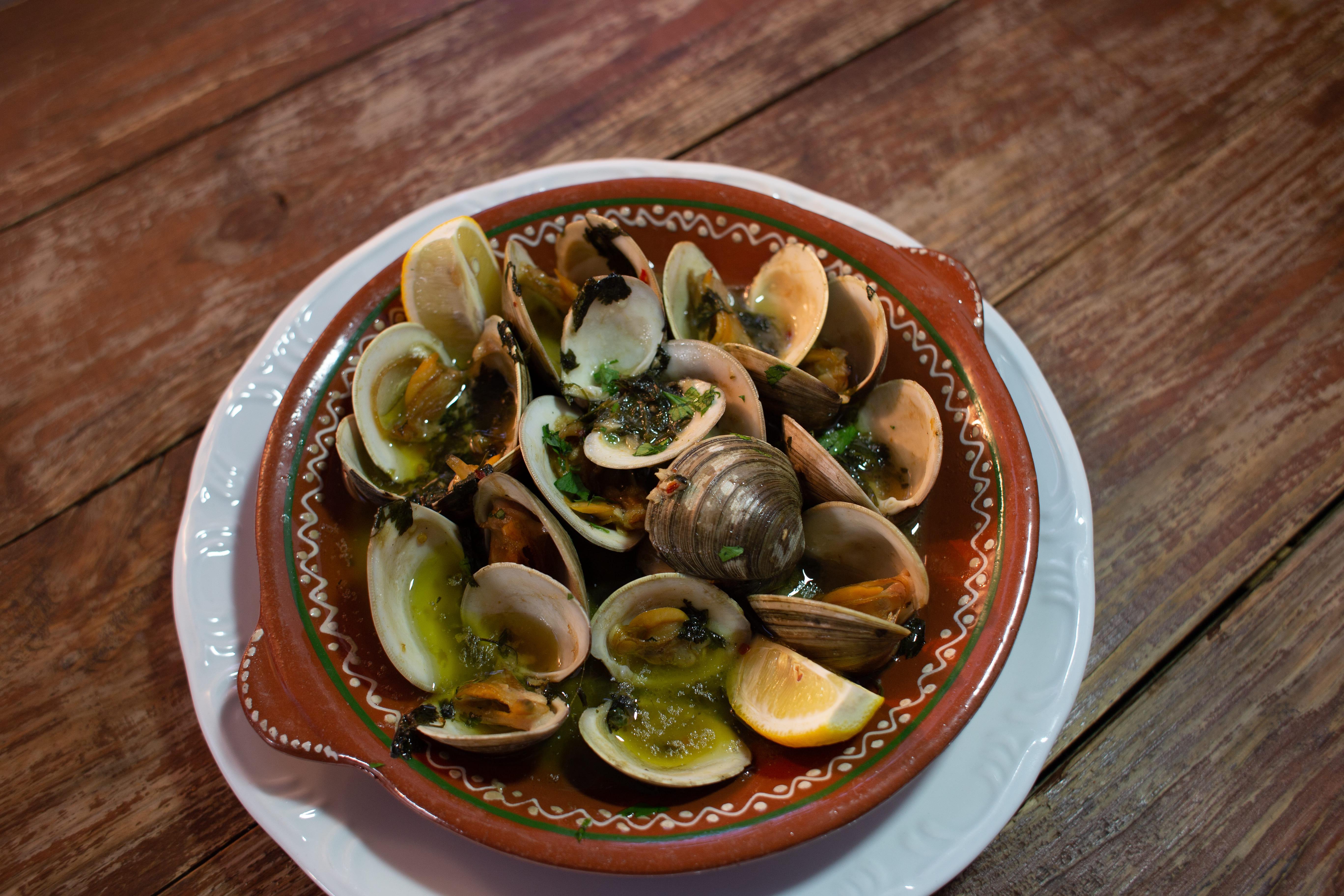 Order CLAMS IN GREEN SAUCE food online from Picnic Portuguese Bbq store, Newark on bringmethat.com