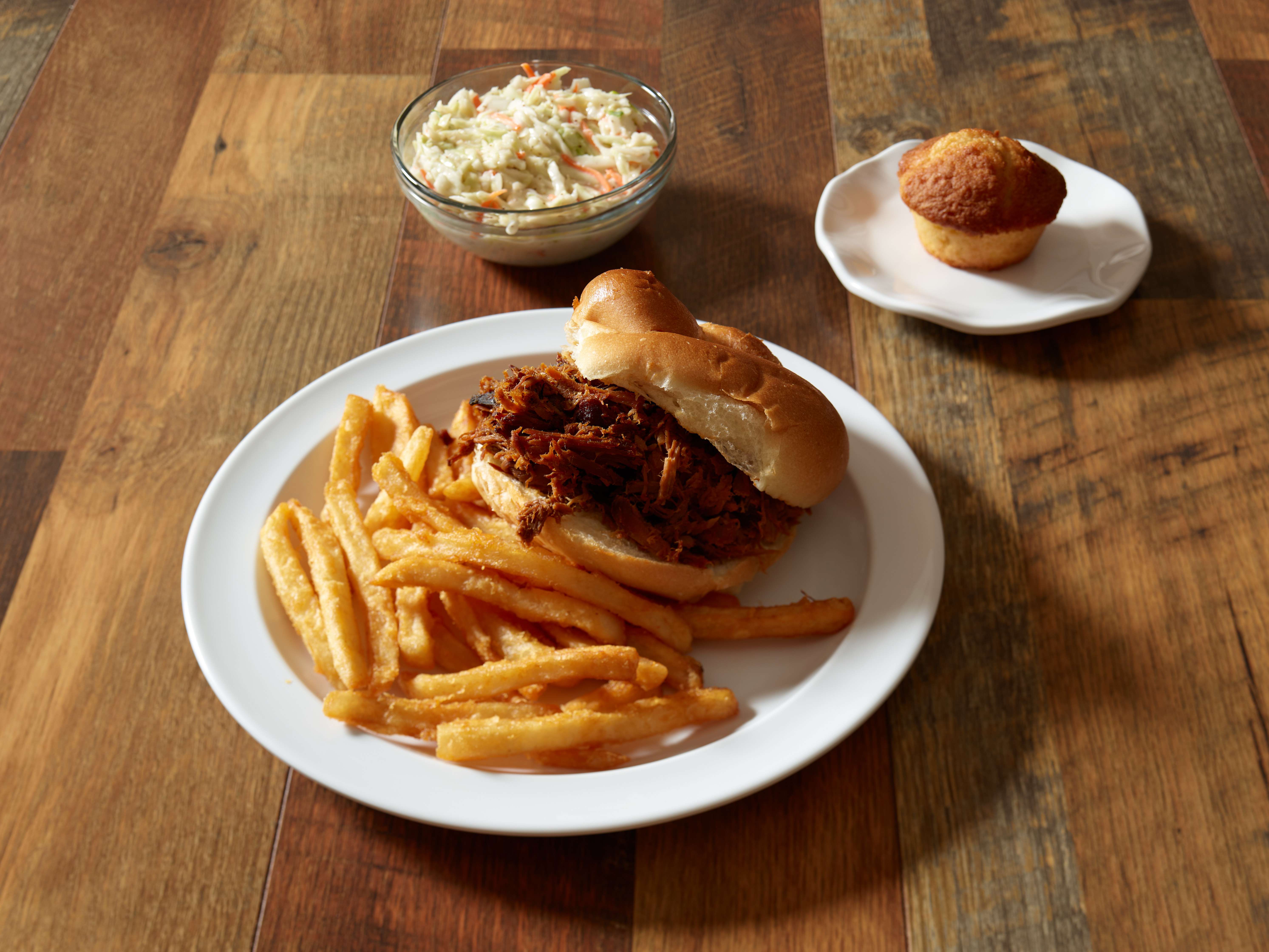 Order Rodeo Pulled Pork Sandwich with 2 Sides food online from Texas Bar-B-Q Joint store, Spencerport on bringmethat.com