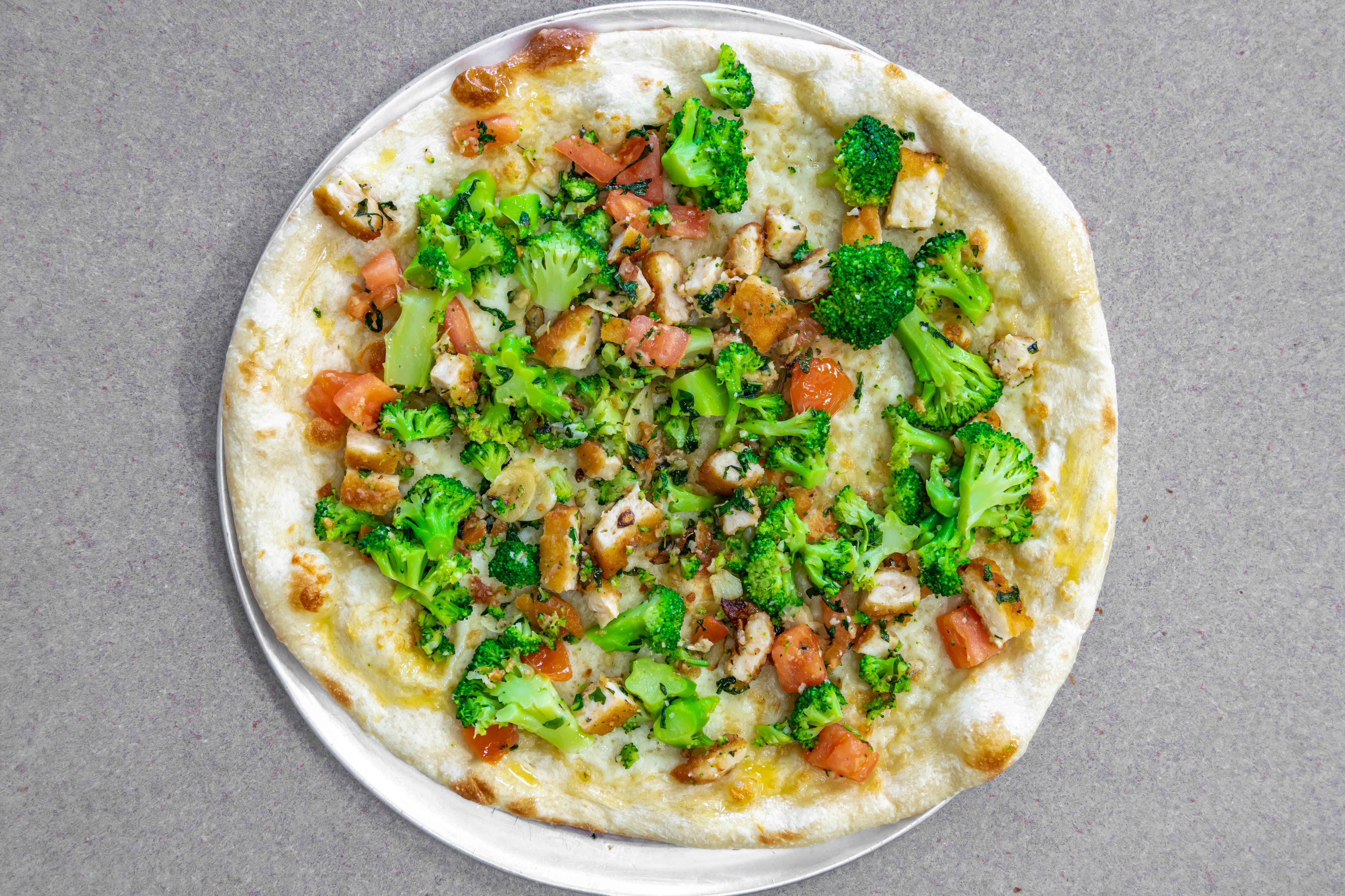 Order Chicken Broccoli & Tomato Pan Pizza - 18'' food online from Bella Pizza 2 store, Somerset on bringmethat.com
