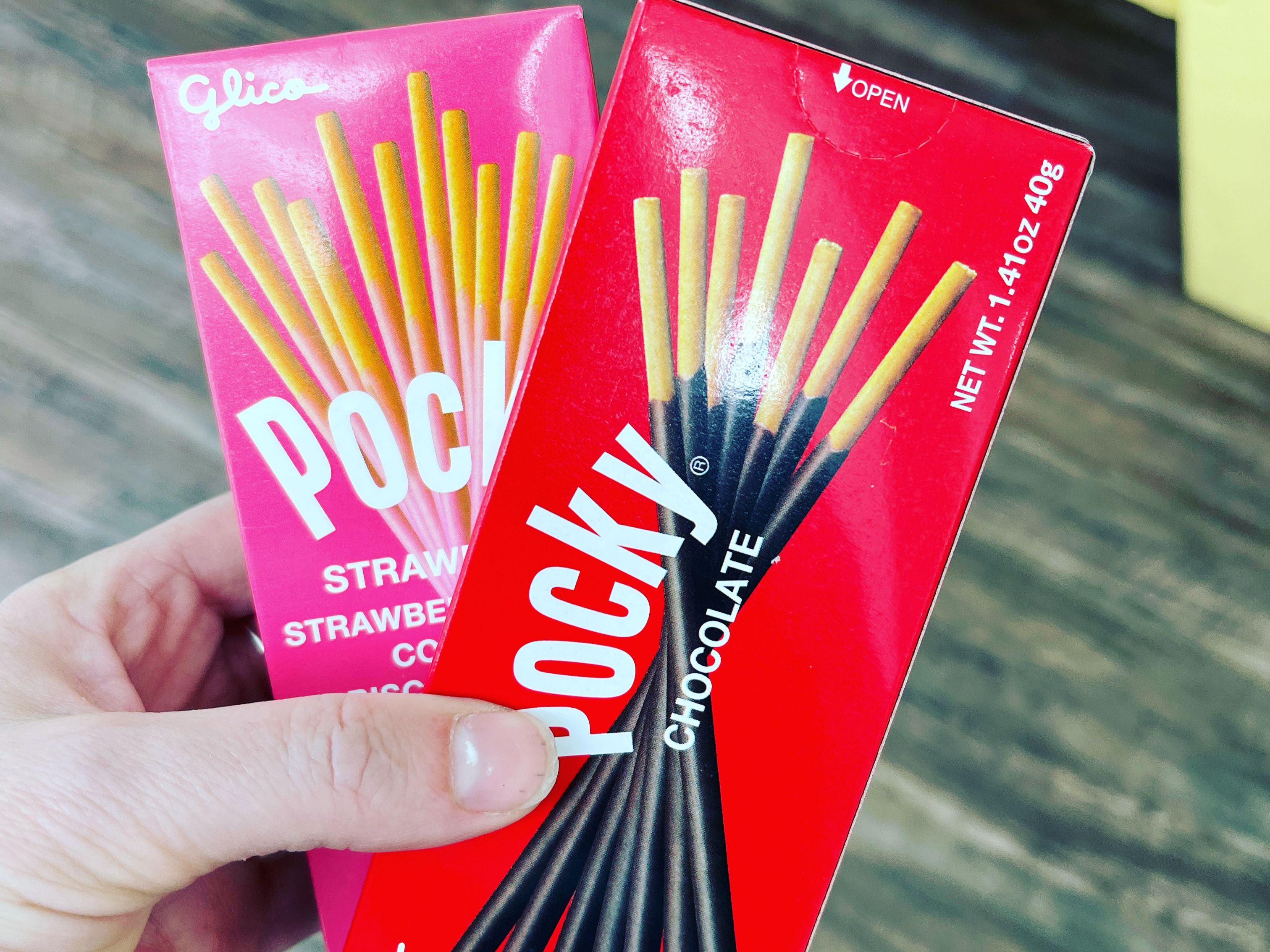 Order POCKY-Chocolate food online from Ohana Island Kitchen store, Denver on bringmethat.com