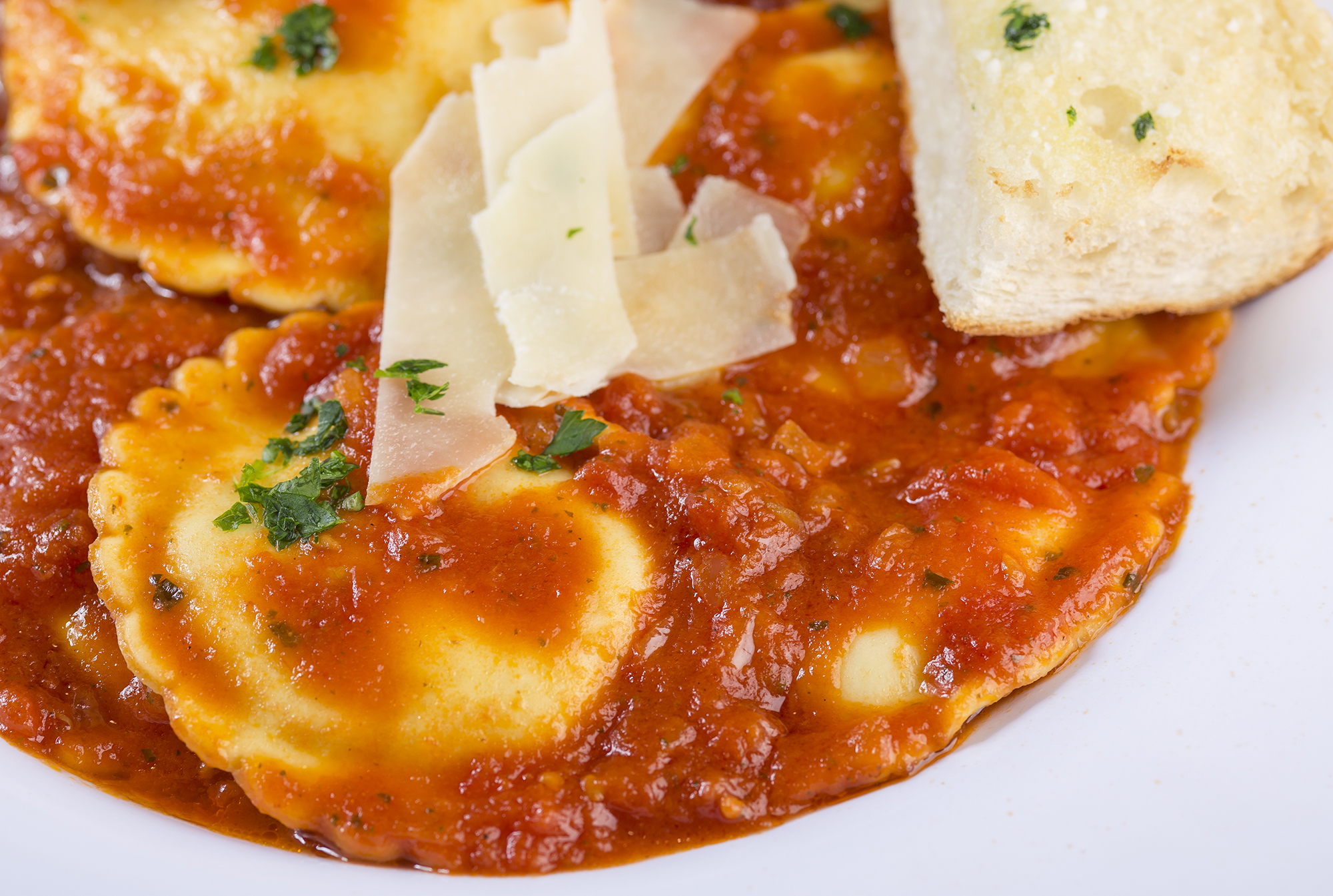 Order 4 Cheese Ravioli Individual Pasta food online from Papa Saverios Pizzeria store, West Chicago on bringmethat.com