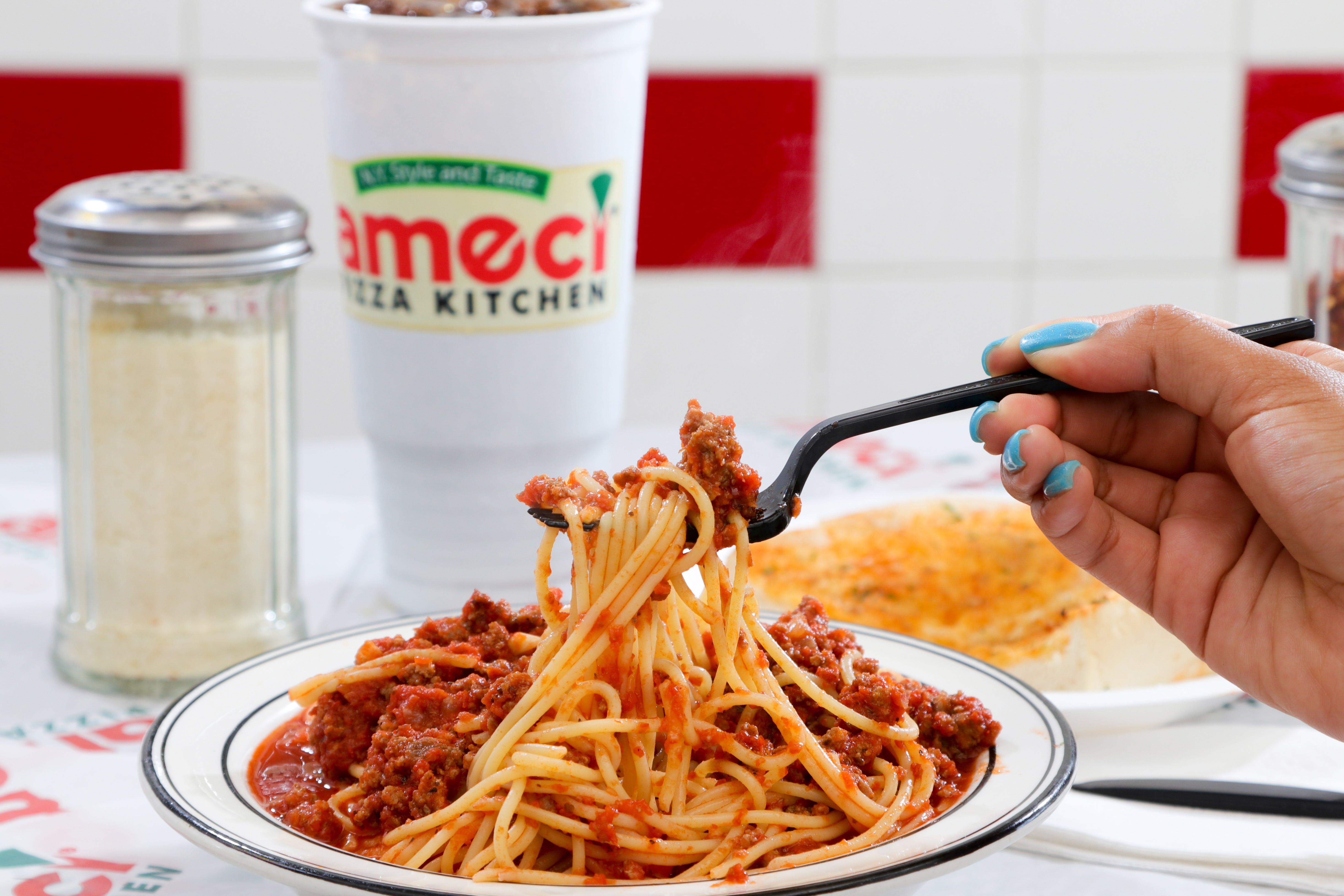 Order Spaghetti with Meat Sauce - Regular food online from Ameci Pizza & Pasta store, Camarillo on bringmethat.com