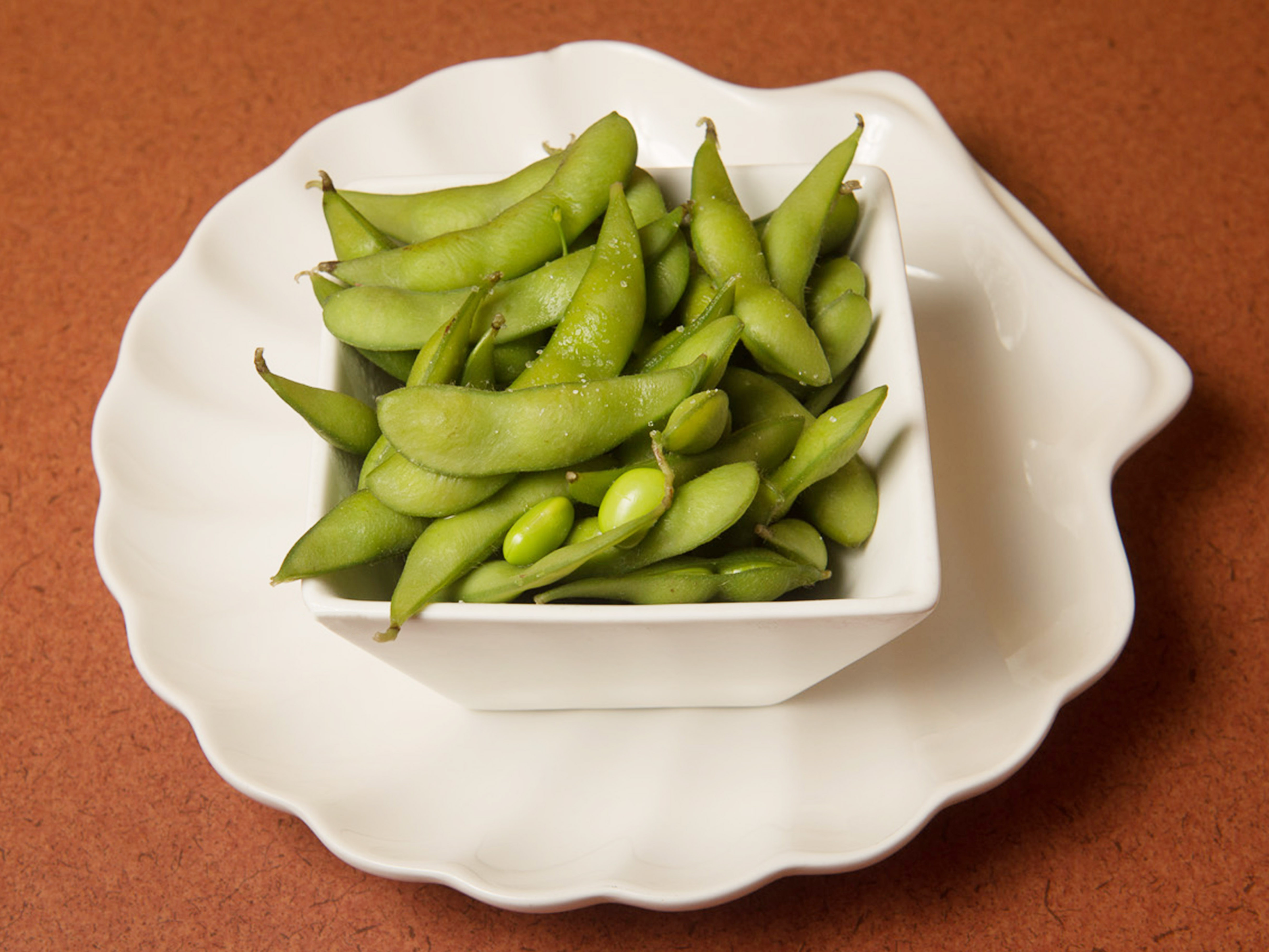Order 2. Steamed Edamame food online from Mr. Sake Sushi & Grill store, Louisville on bringmethat.com