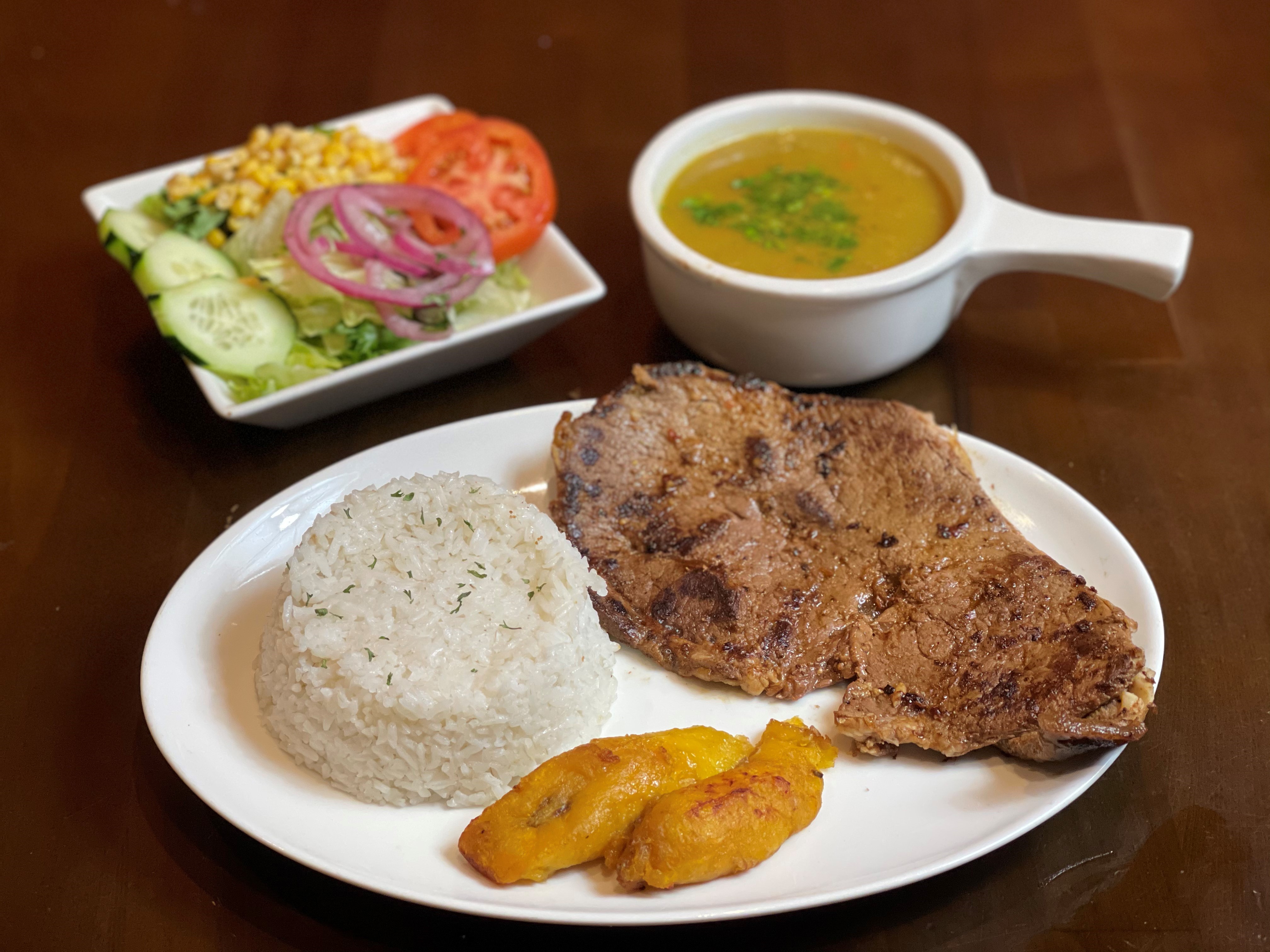 Order Carne Asada Special. M-F Until 5pm food online from Noches De Colombia store, Randolph on bringmethat.com